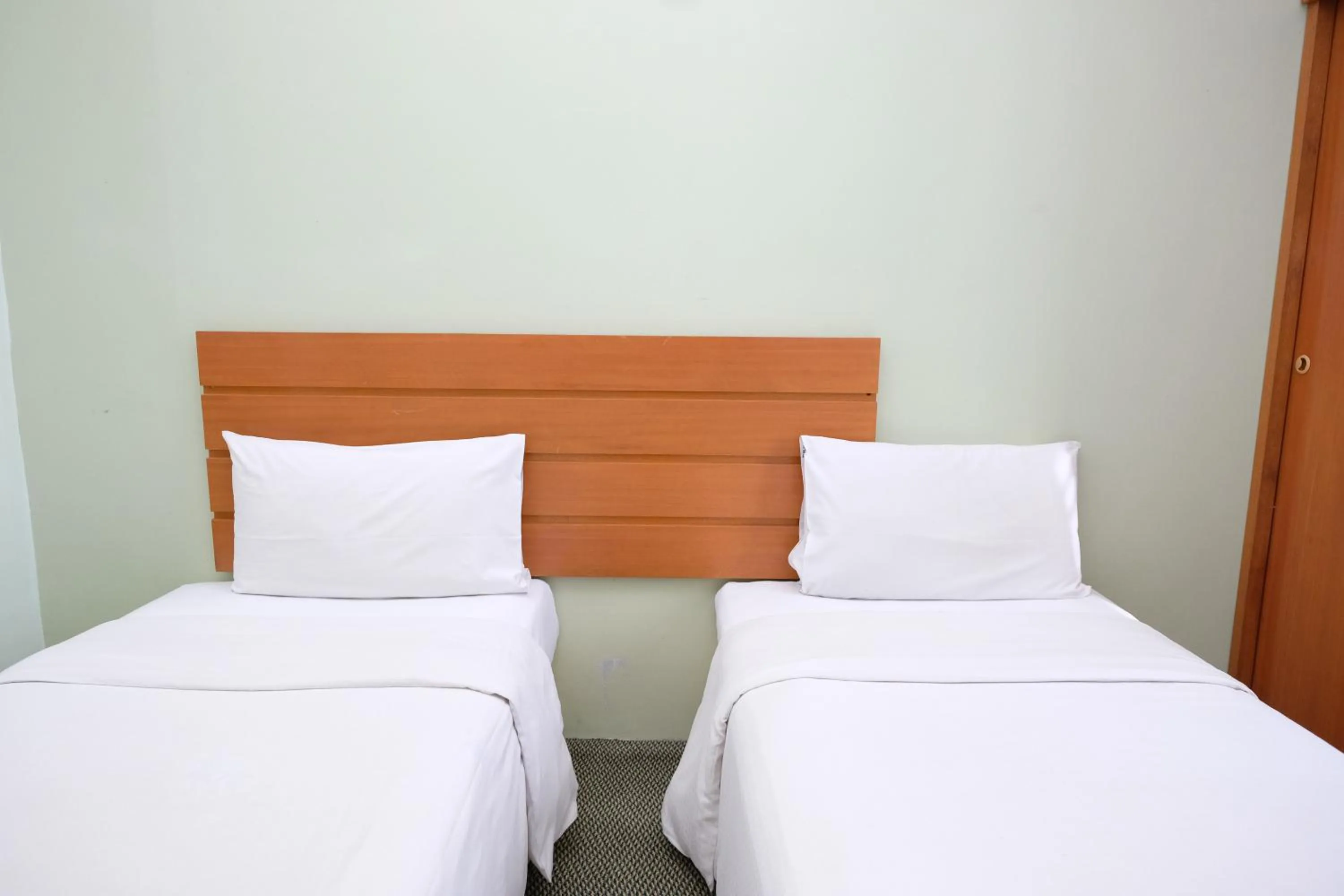 Bed in Ridel Boutique Hotel