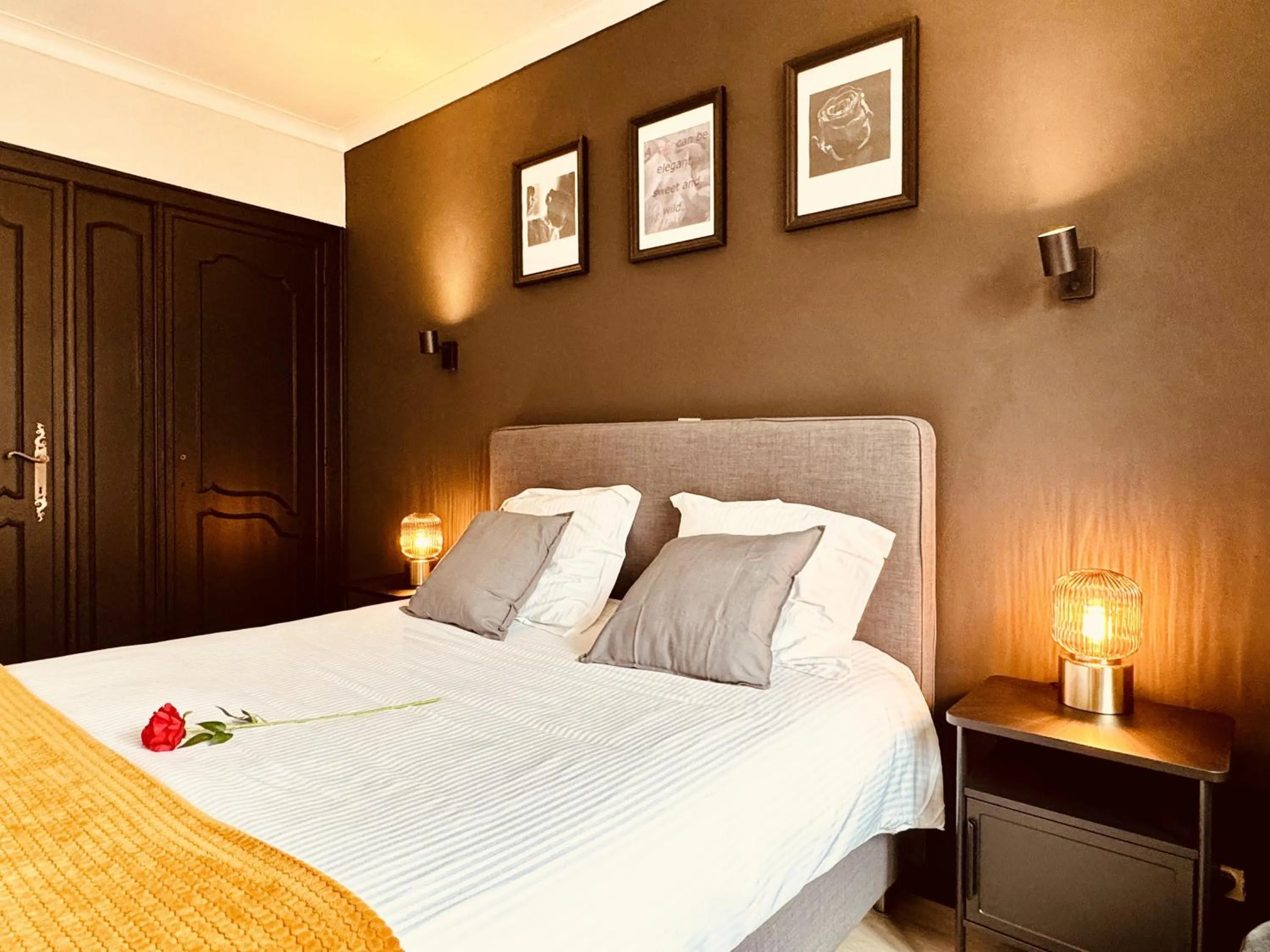 Bed in The Rose Suites