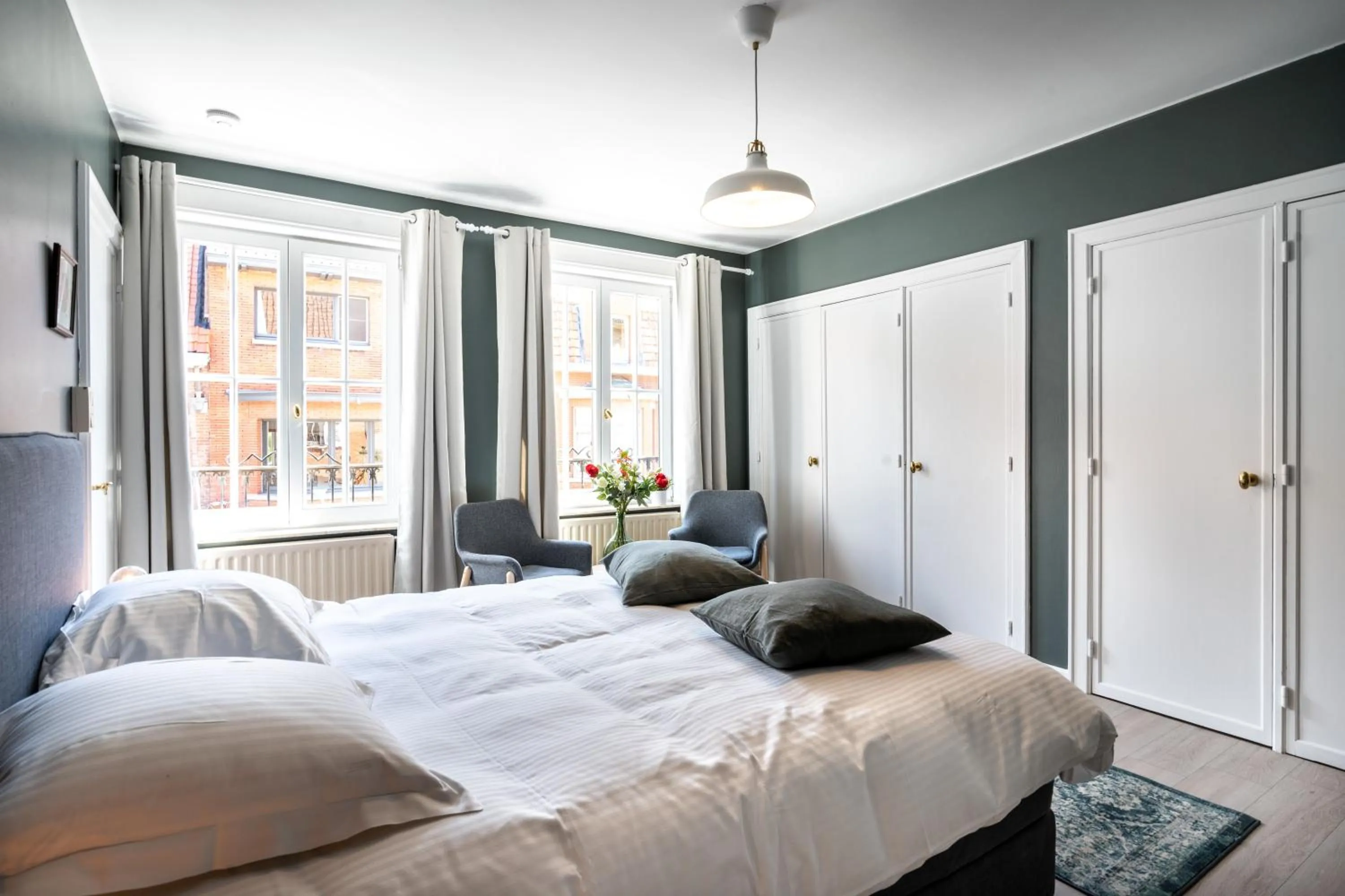 Bed in The Rose Suites