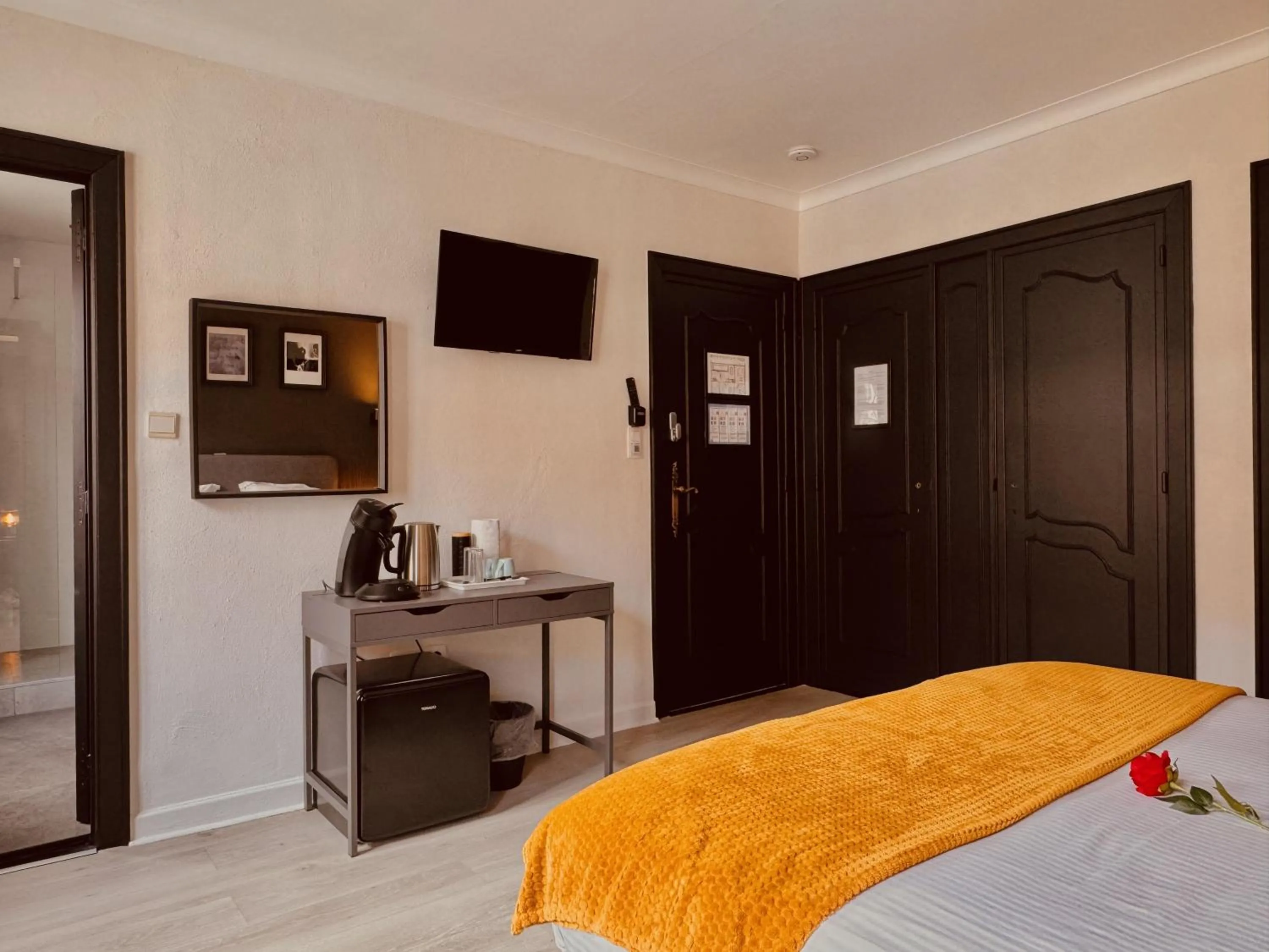 Bed in The Rose Suites