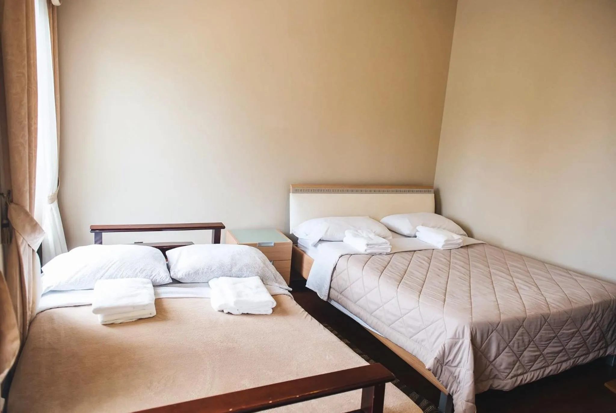 Bed in JstLikeHome - Luxury Mansion & Guesthouse