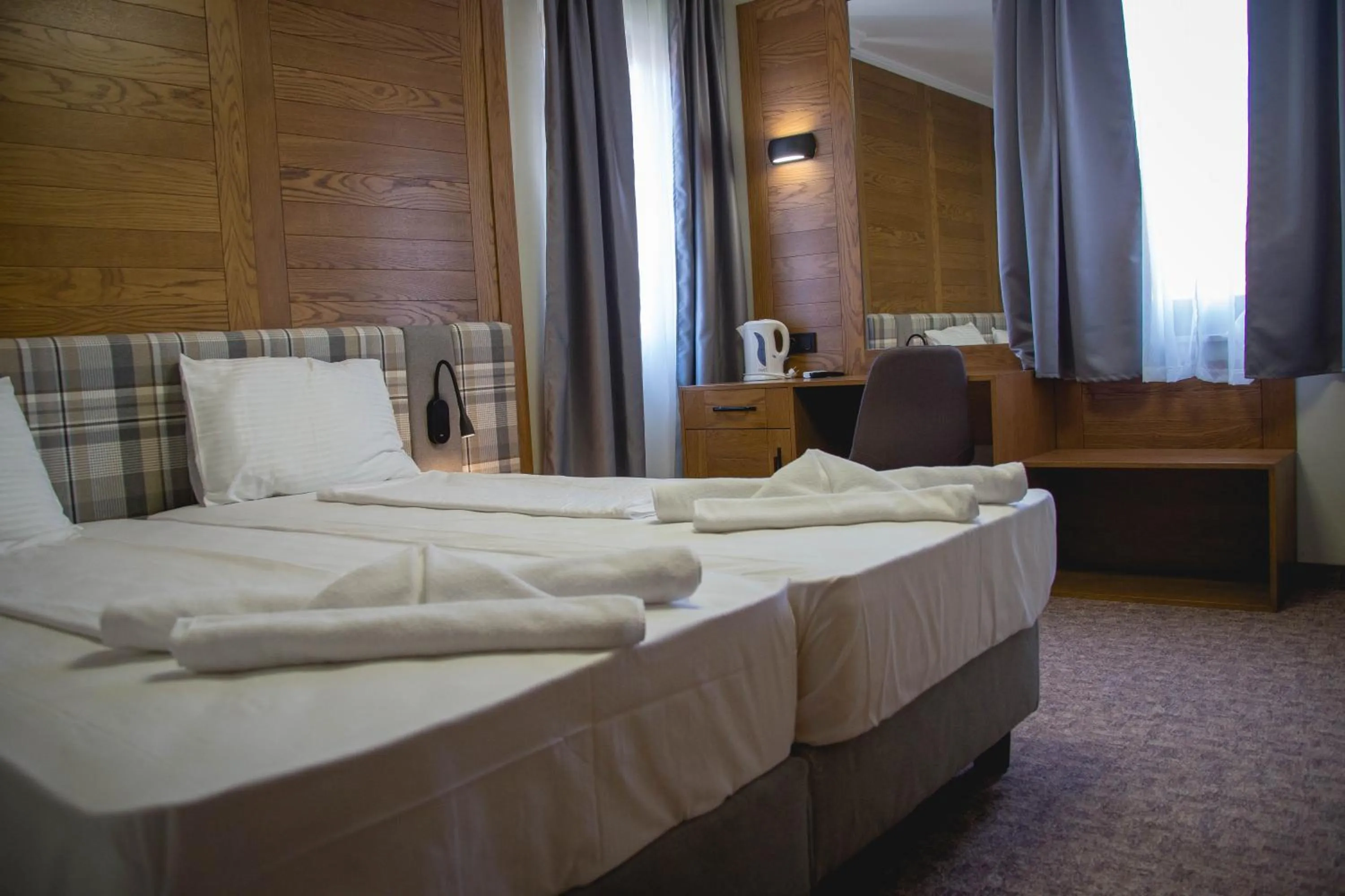 Bed in Prince Cyril Hotel