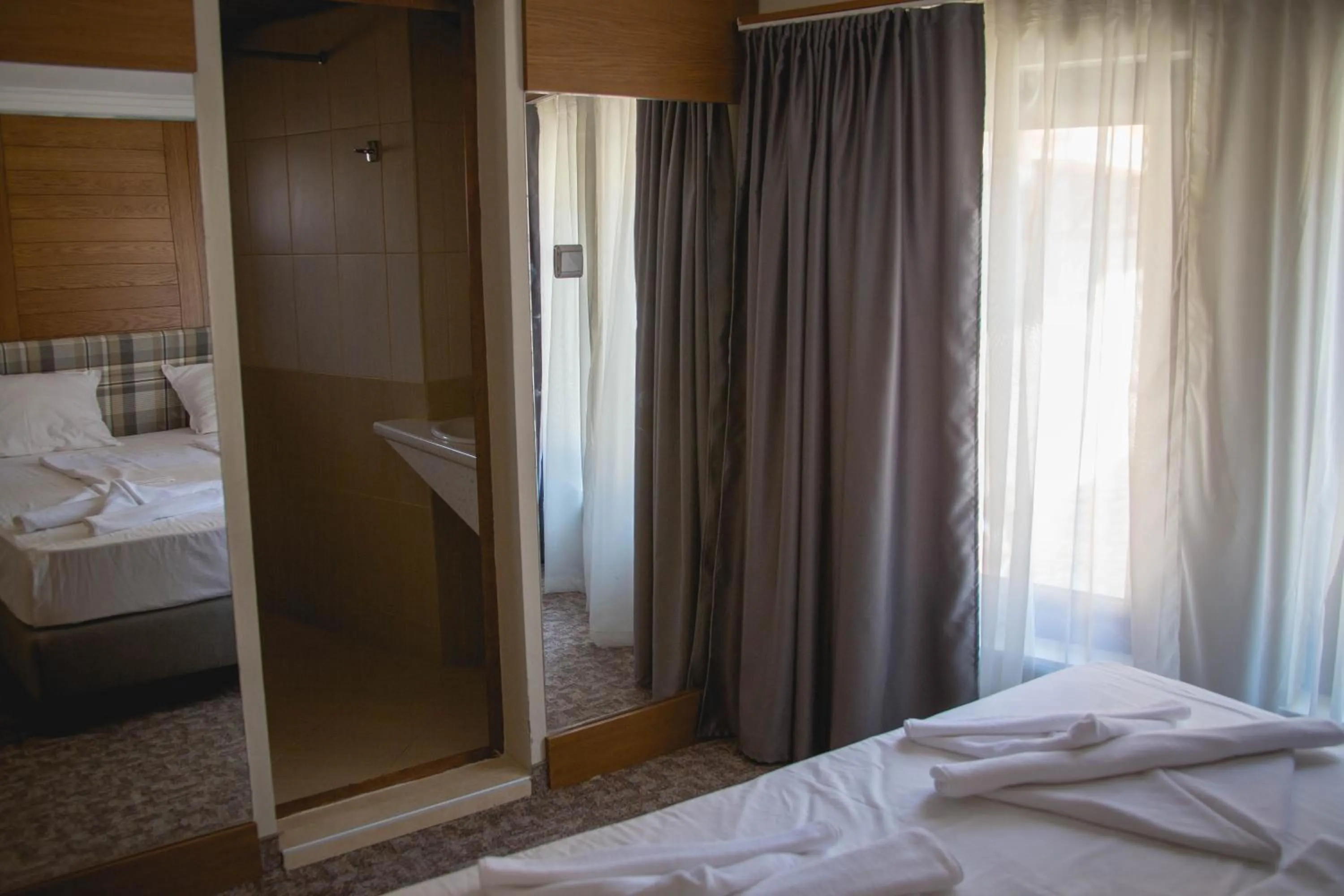 Bed in Prince Cyril Hotel