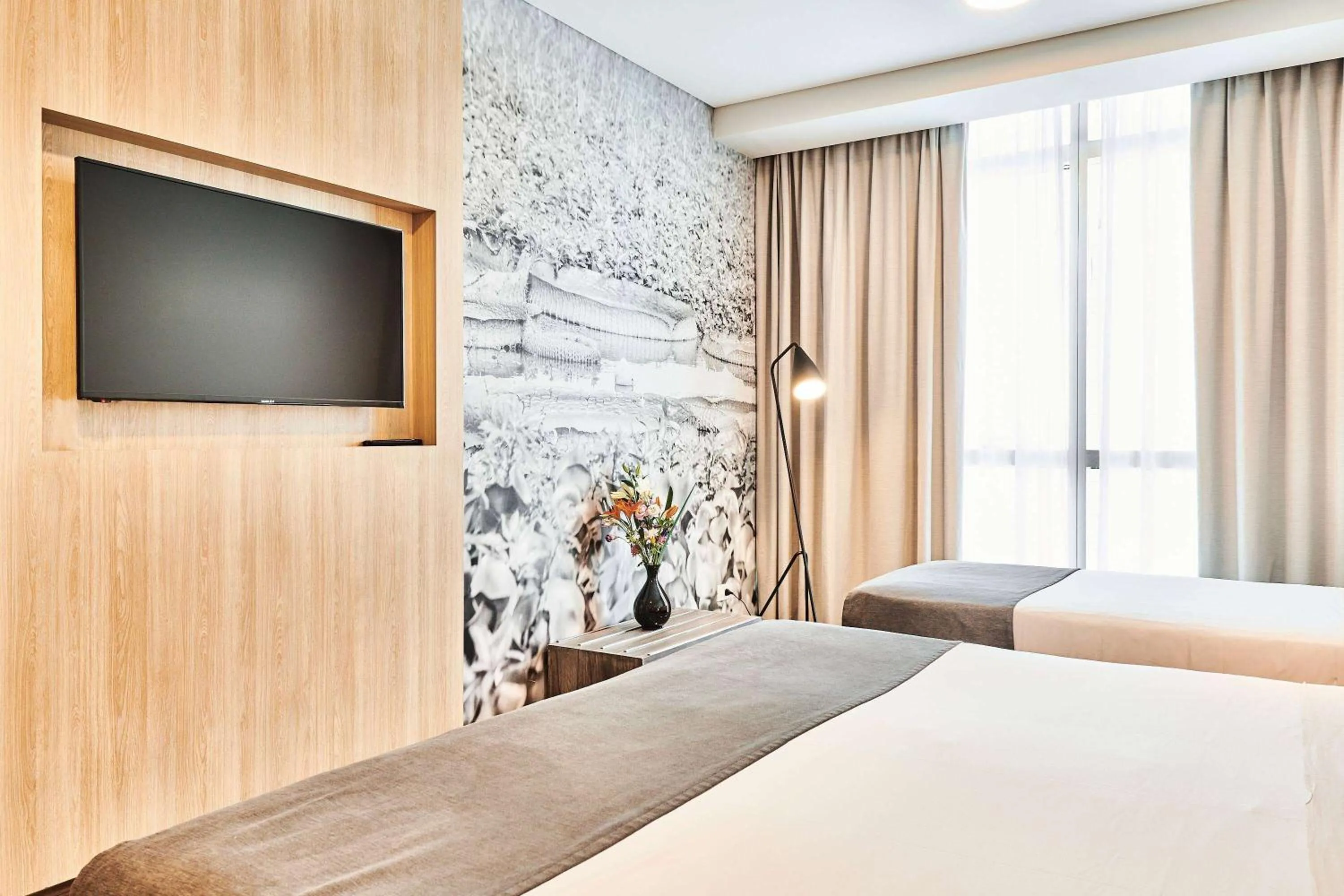 Photo of the whole room, Bed in Dazzler by Wyndham Rosario