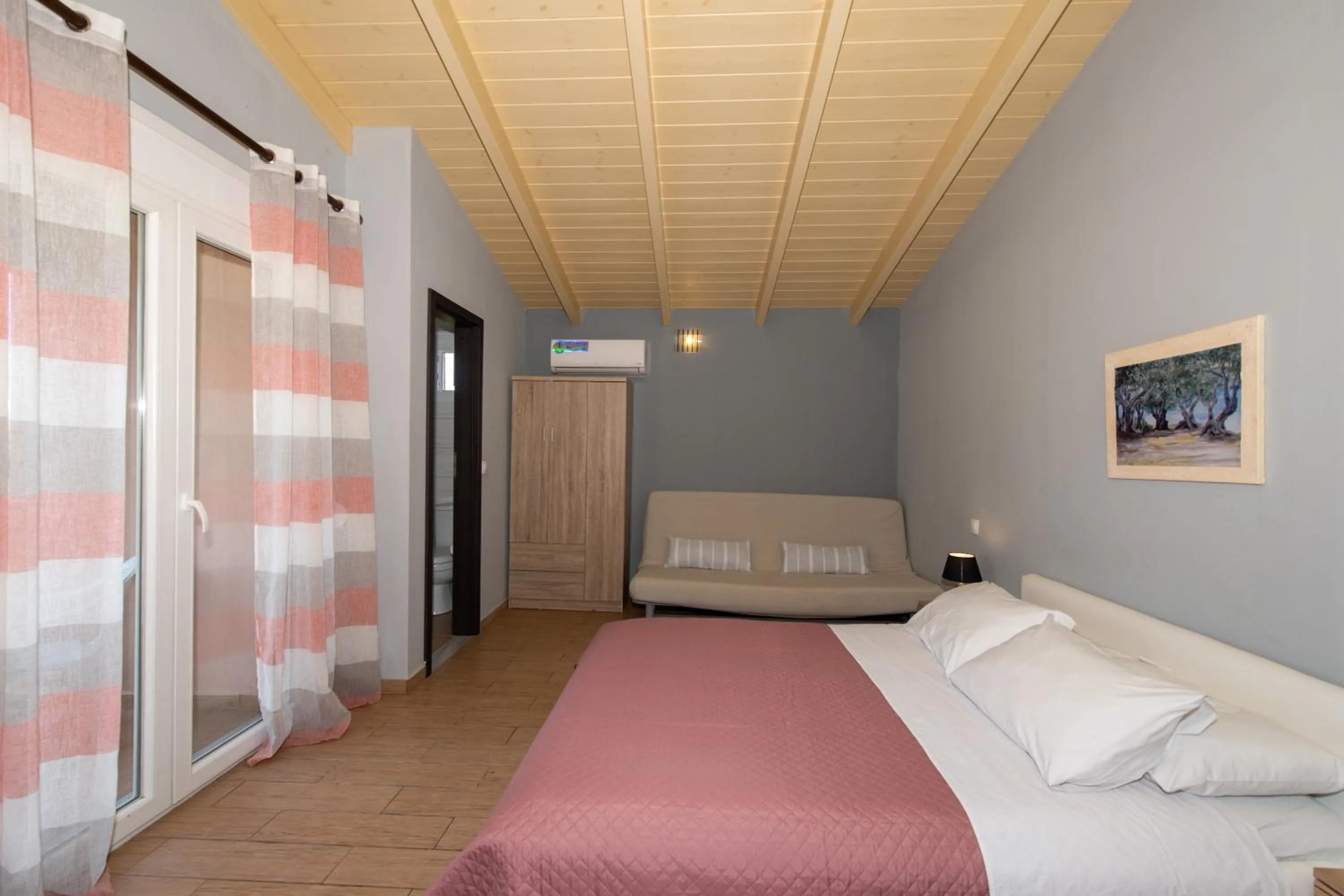 Bed in Tsolakis Studios & Apartments