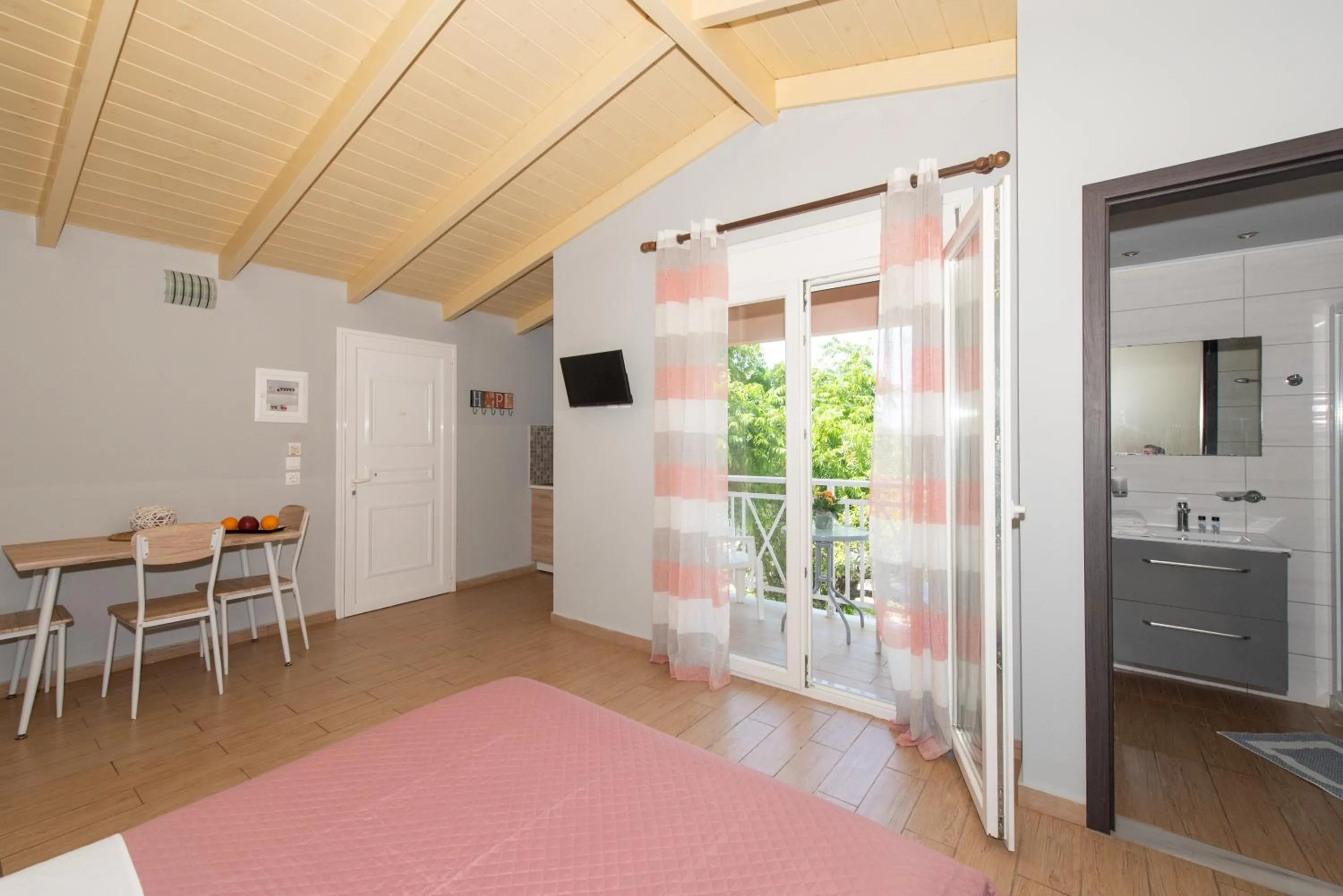 Bed in Tsolakis Studios & Apartments