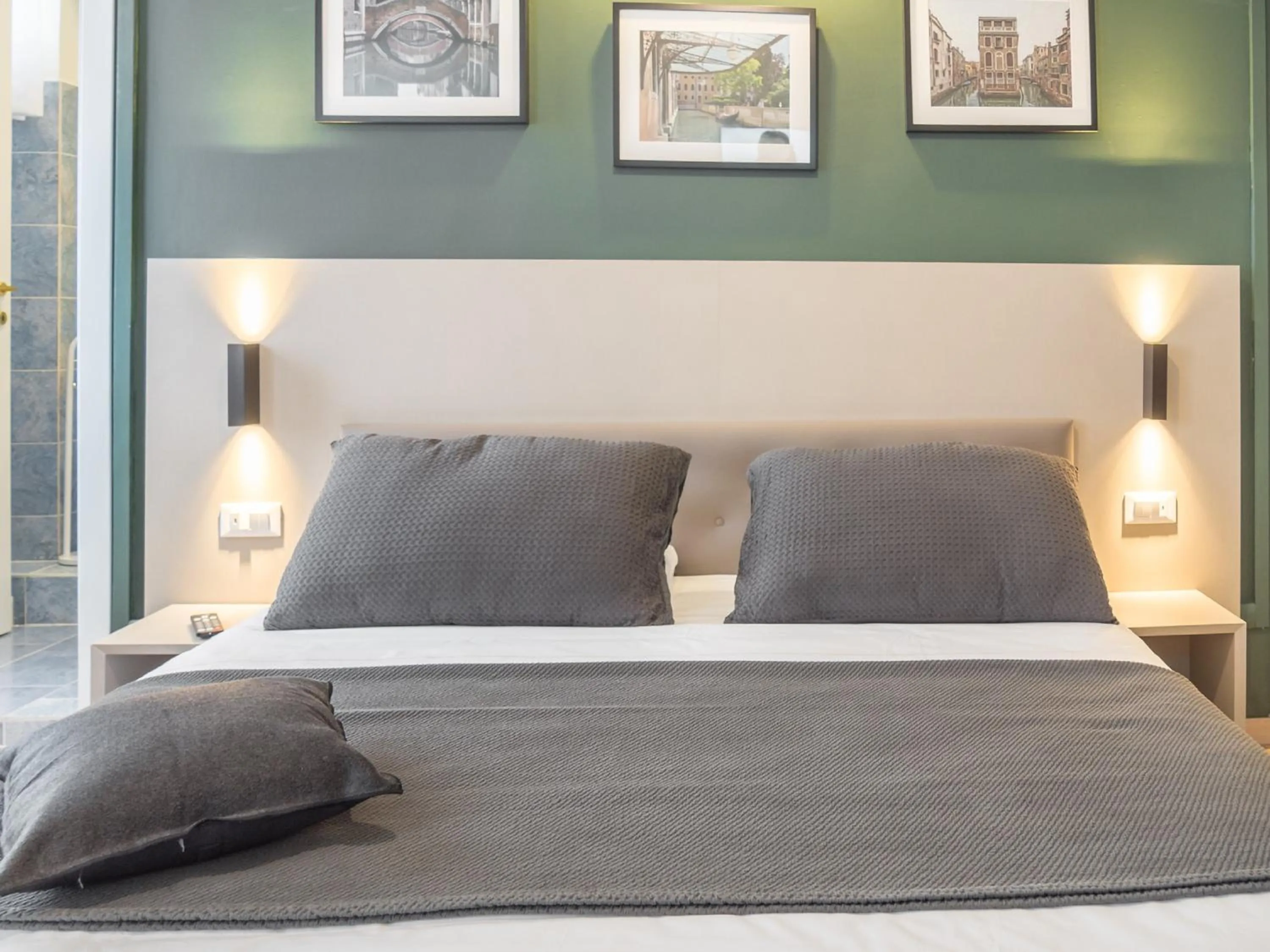 Bed in Grand Canal Suite by Wonderful Italy