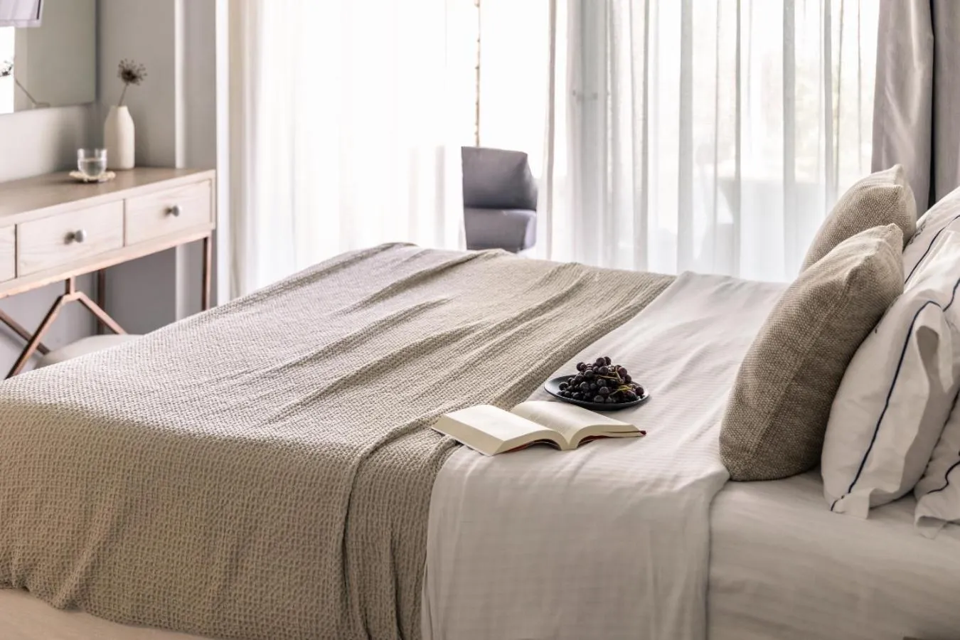 Bed in Blue Carpet Luxury Suites