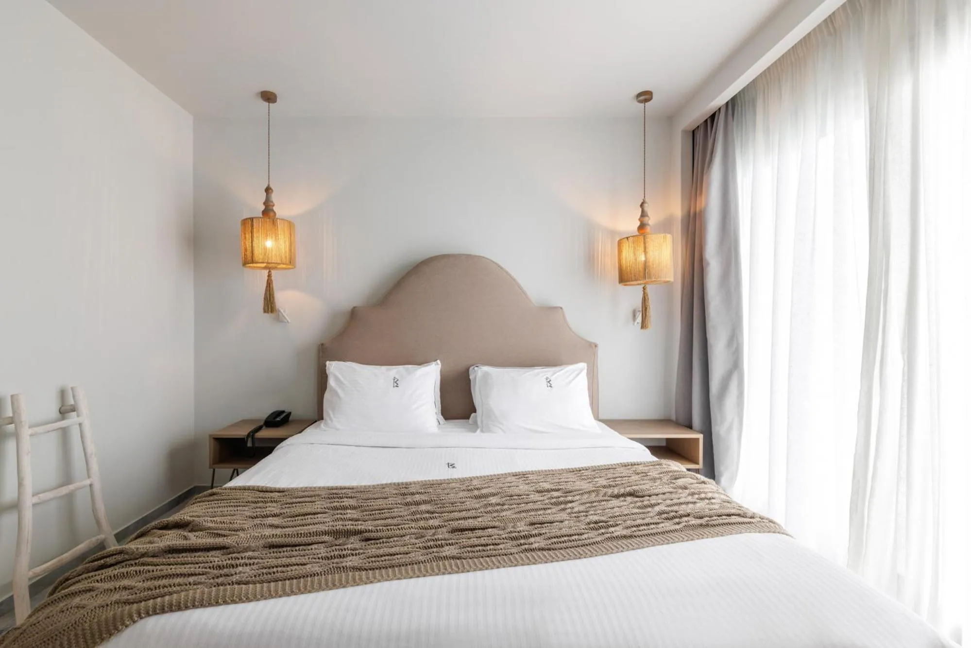 Bed in Blue Carpet Luxury Suites