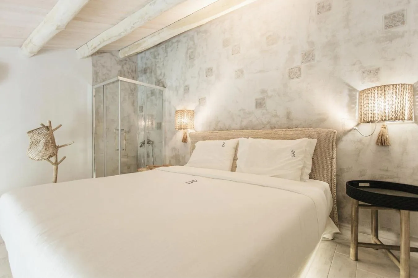 Bed in Blue Carpet Luxury Suites