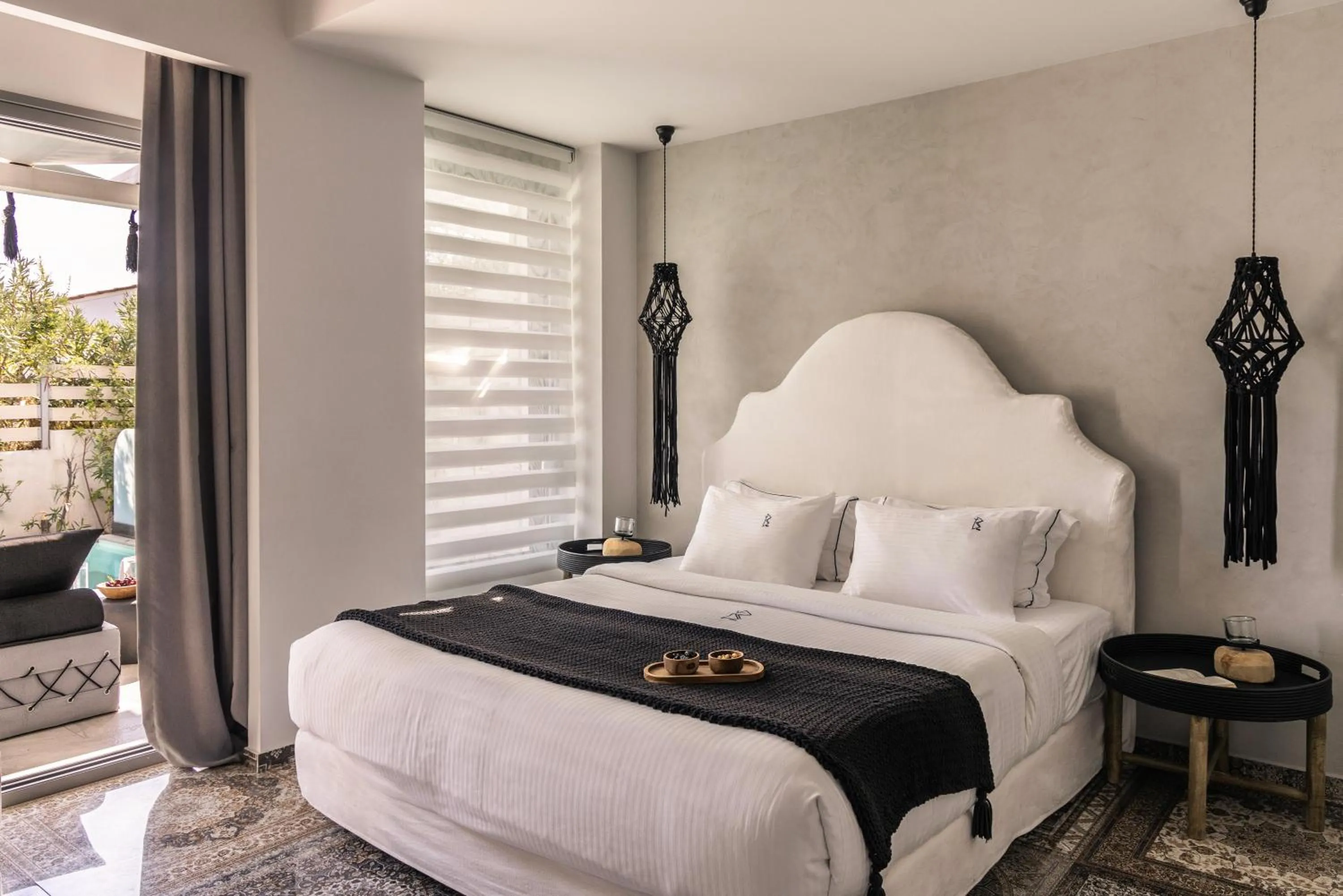 Bed in Blue Carpet Luxury Suites