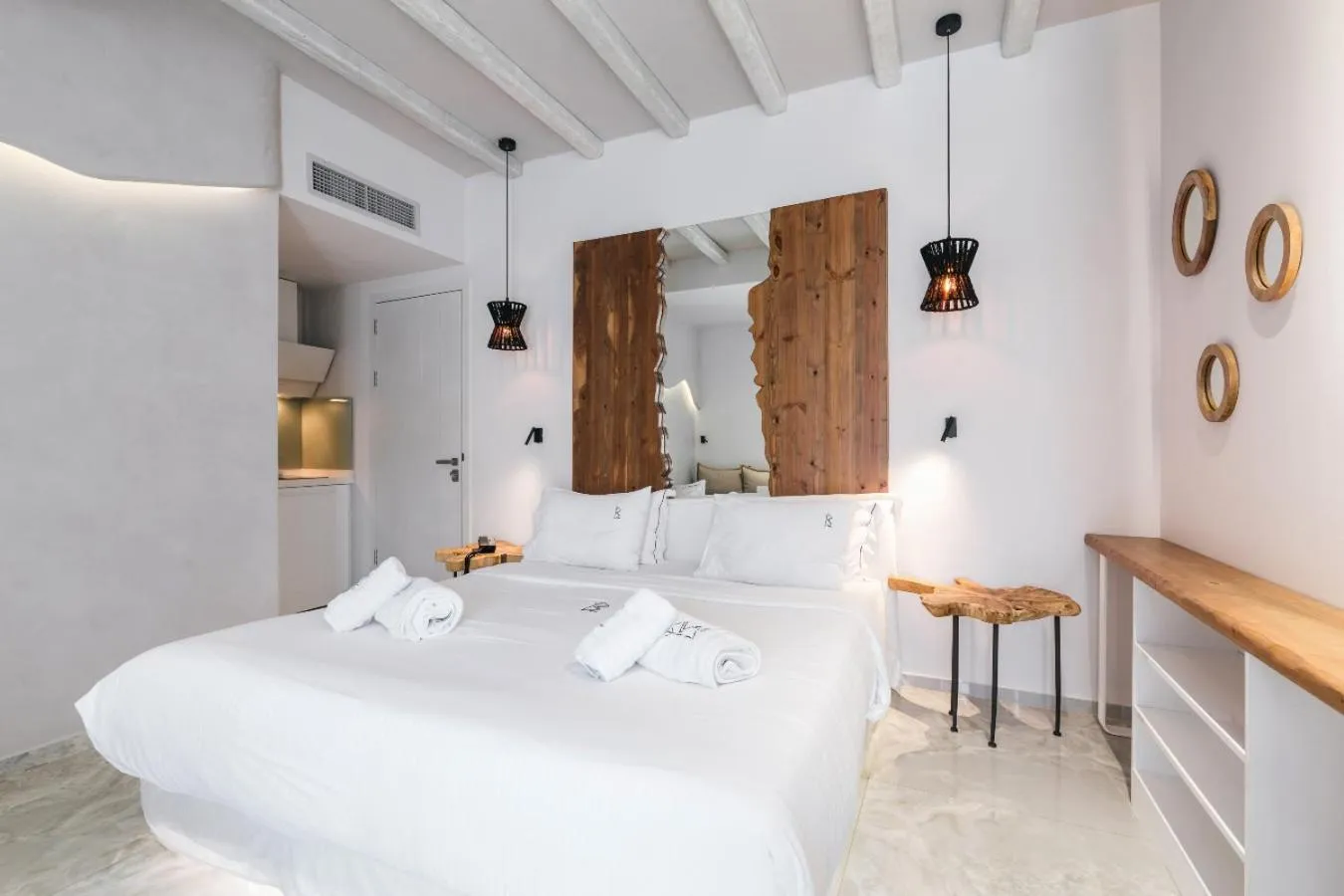 Bed in Blue Carpet Luxury Suites