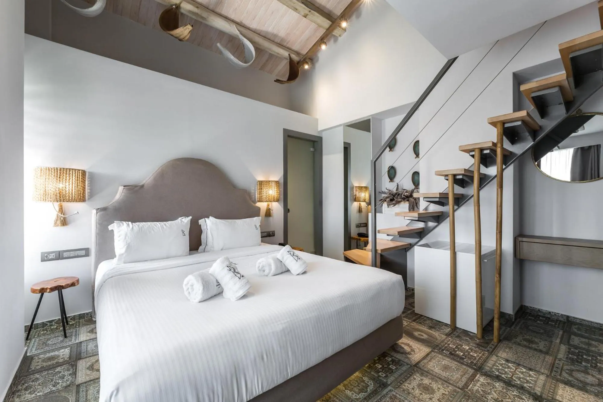 Bed in Blue Carpet Luxury Suites