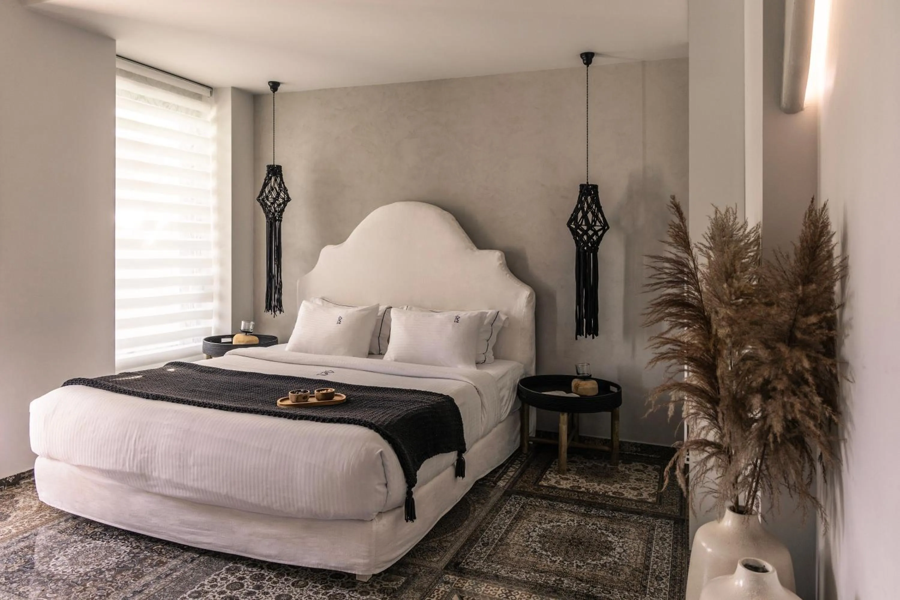 Bed in Blue Carpet Luxury Suites