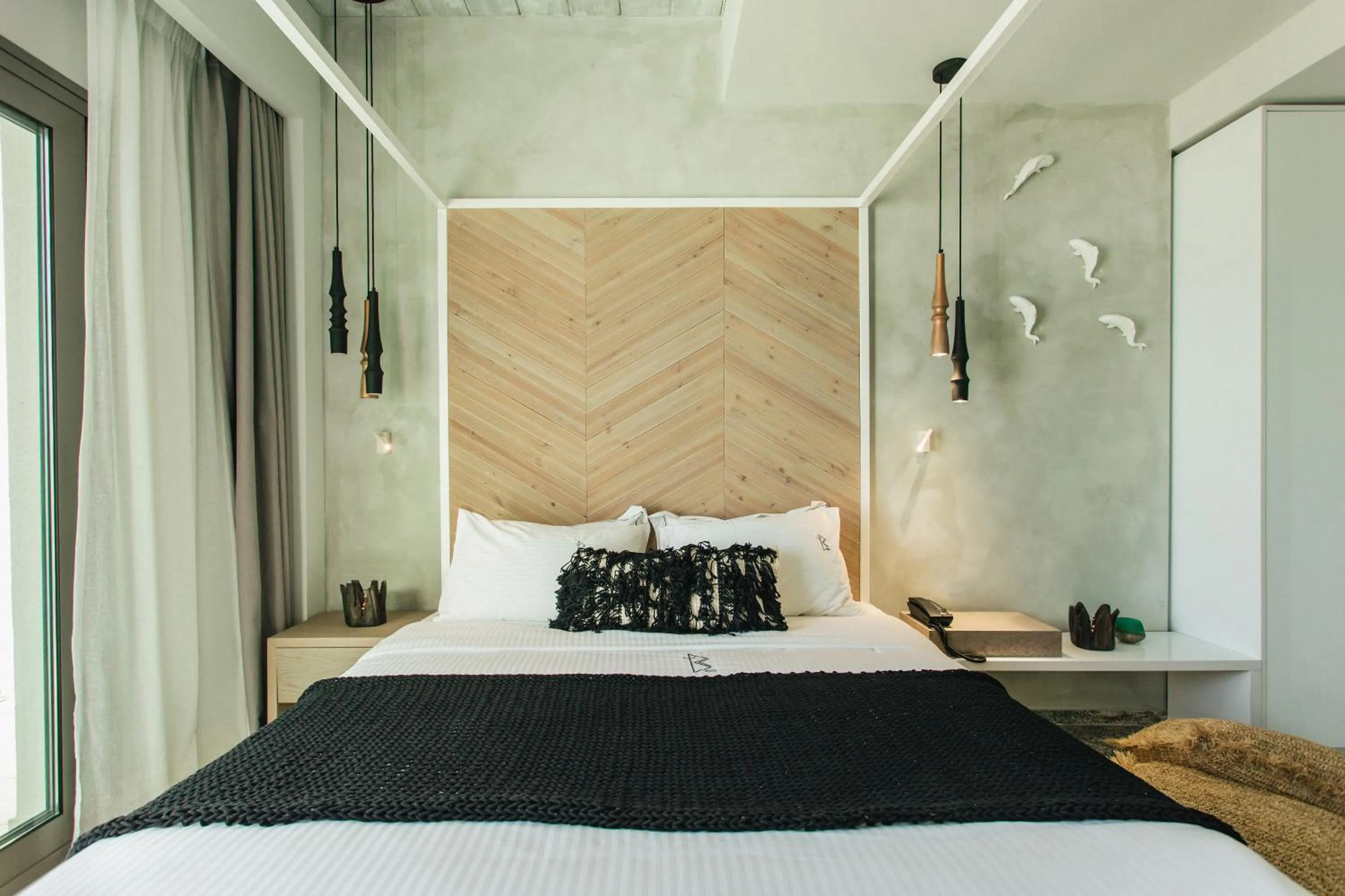 Bed in Blue Carpet Luxury Suites