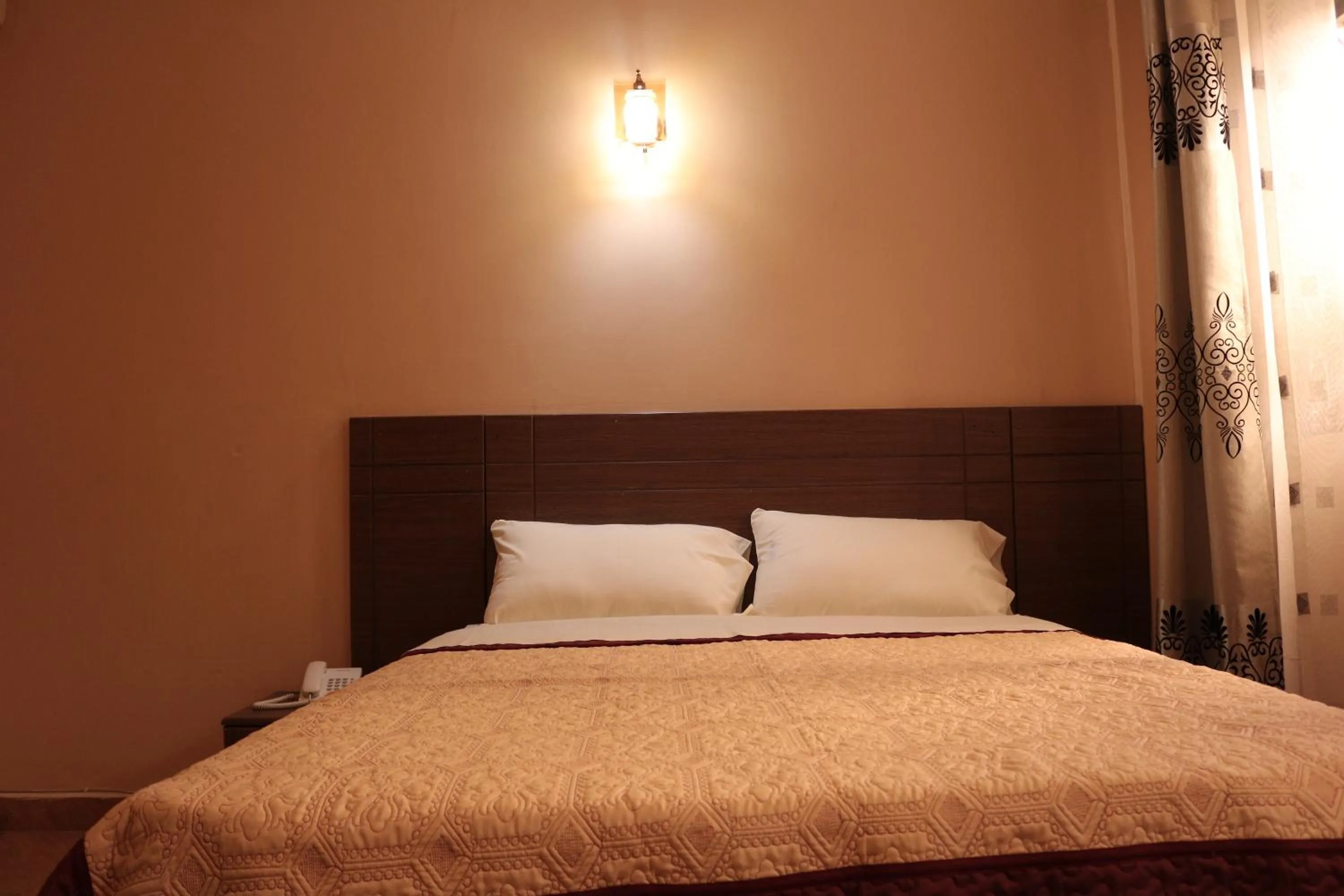 Bed in Agenda 2000 Hotels Ltd