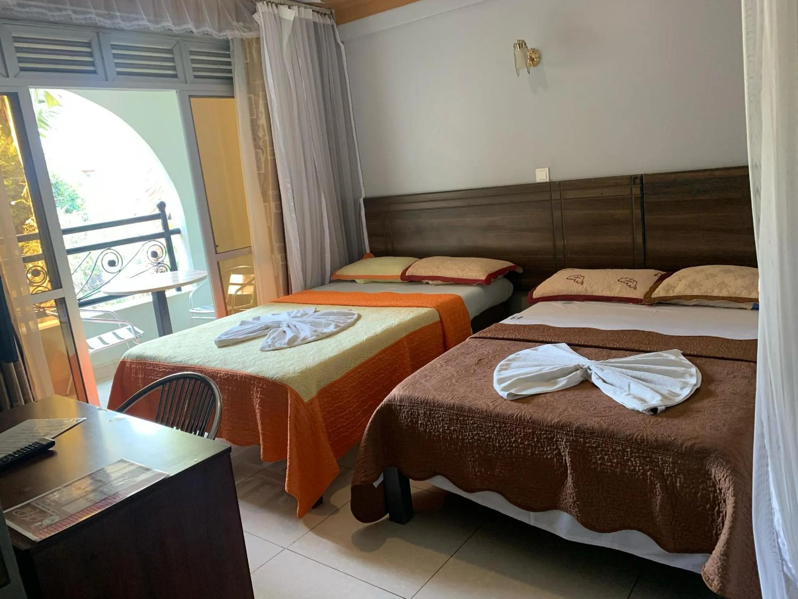 Bed in Agenda 2000 Hotels Ltd