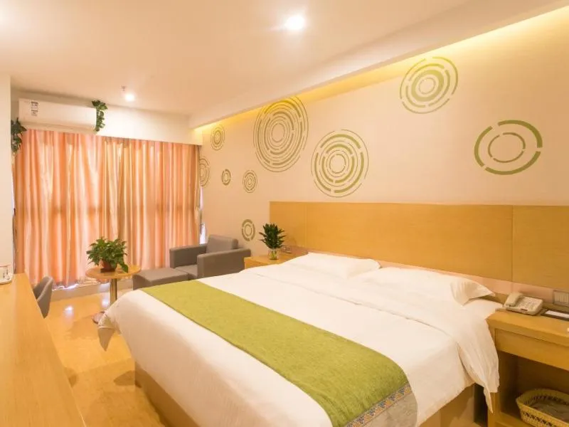 Bed in GreenTree Inn Suzhou Tai Lake Xukou Town Government Express Hotel