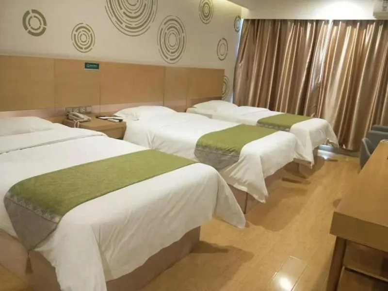 Bed in GreenTree Inn Suzhou Tai Lake Xukou Town Government Express Hotel