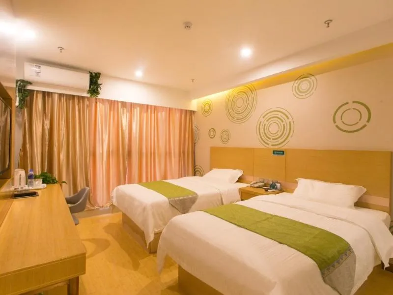 Bed in GreenTree Inn Suzhou Tai Lake Xukou Town Government Express Hotel