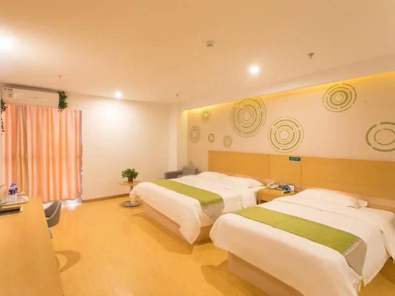 Bed in GreenTree Inn Suzhou Tai Lake Xukou Town Government Express Hotel