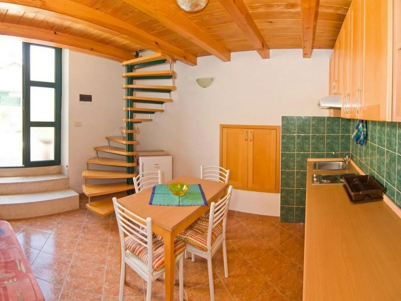 Kitchen or kitchenette in Apartments Sanda