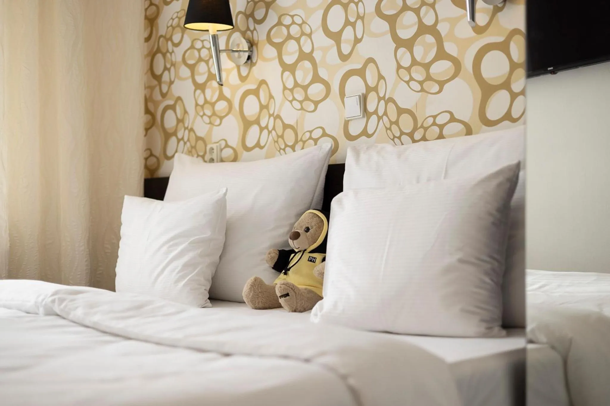 Bed in Pytloun Wellness Travel Hotel