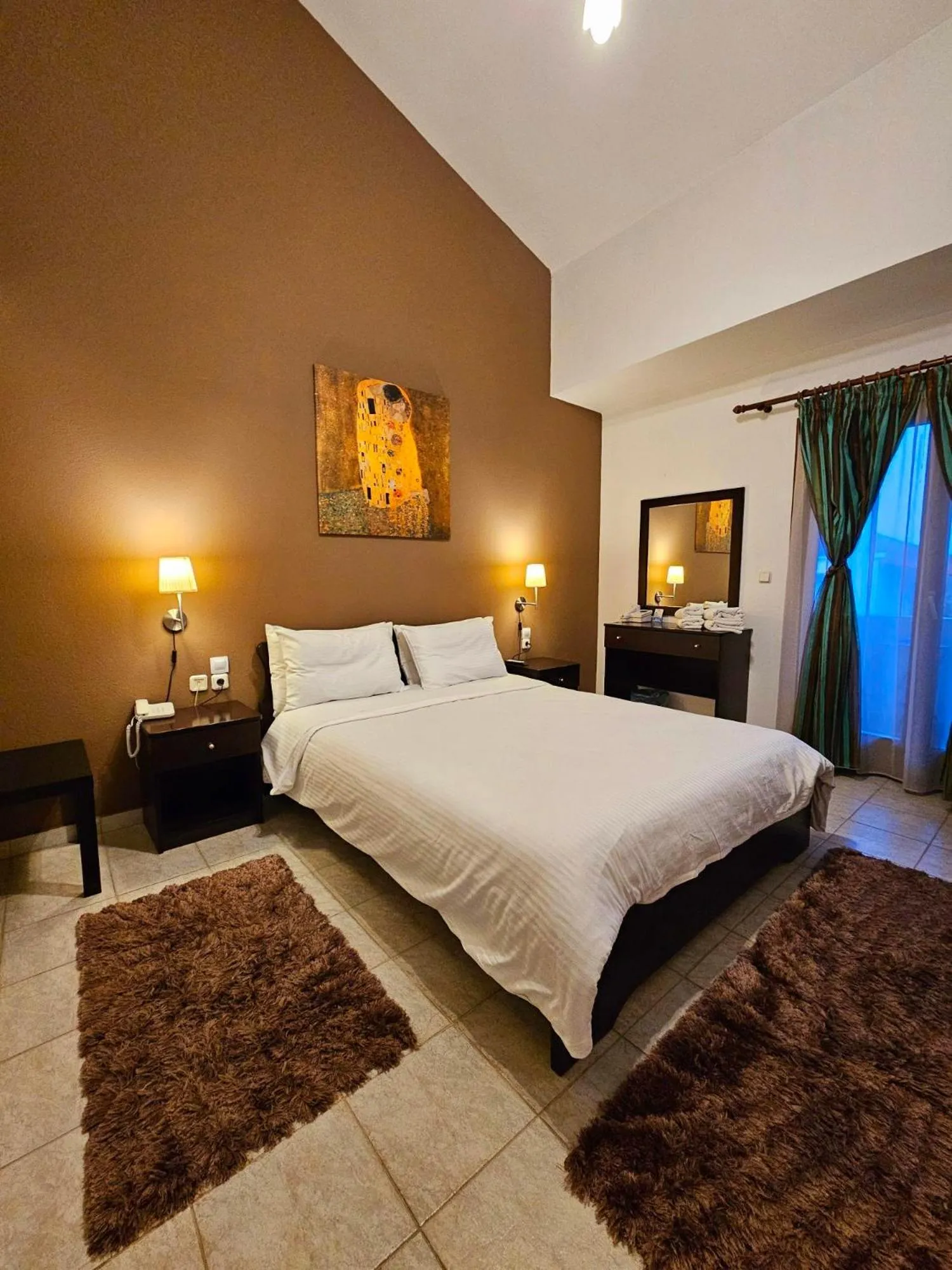 Bed in Hotel Odysseas