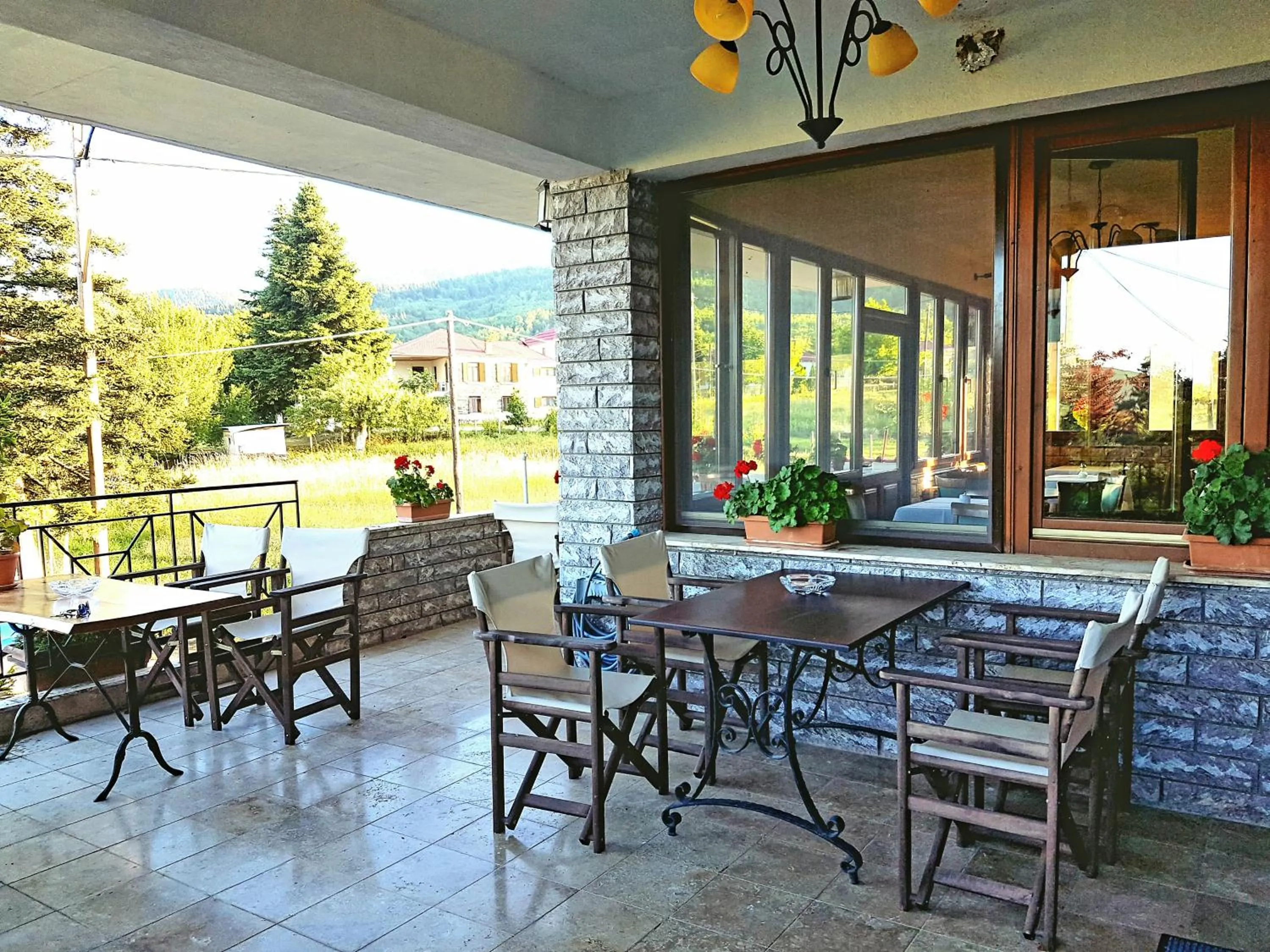 Communal lounge/ TV room in Hotel Odysseas