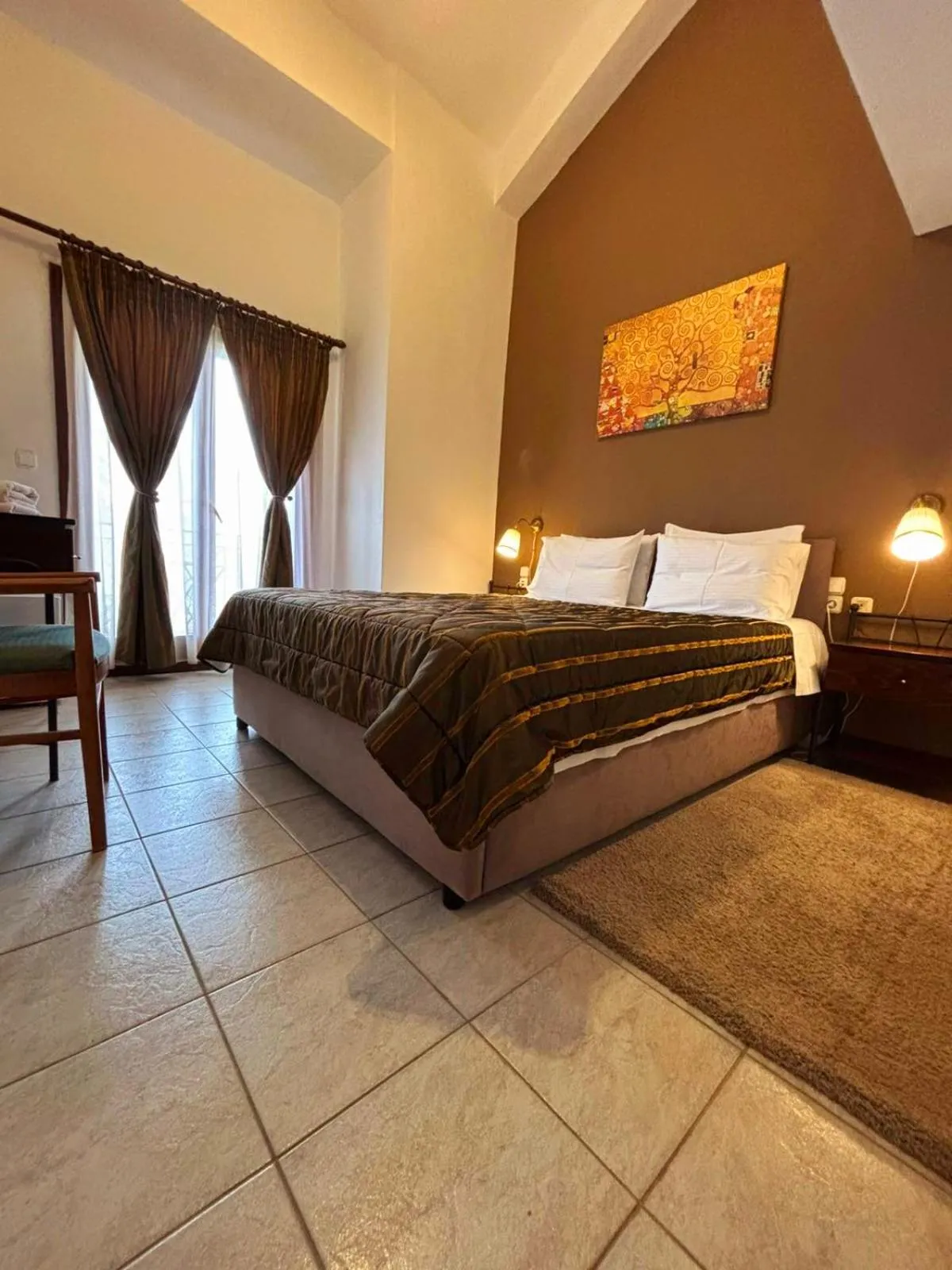 Bed in Hotel Odysseas