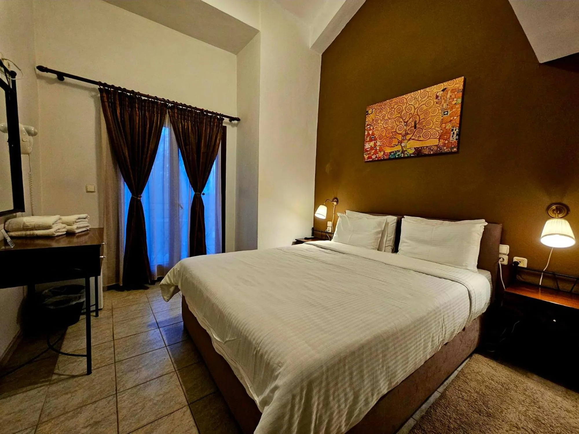 Bed in Hotel Odysseas