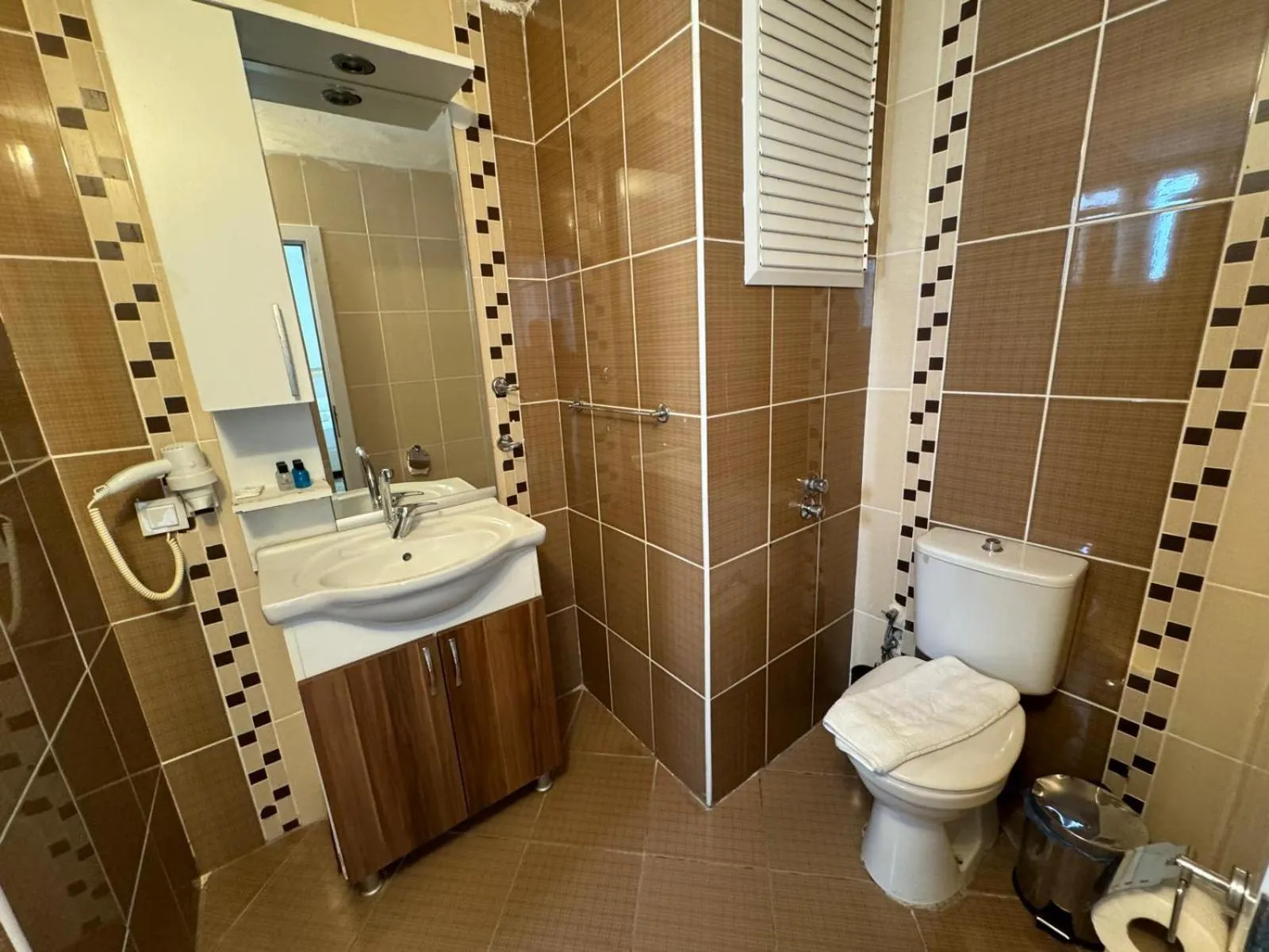 Bathroom in Olimpos Beach Hotel by RRH&R