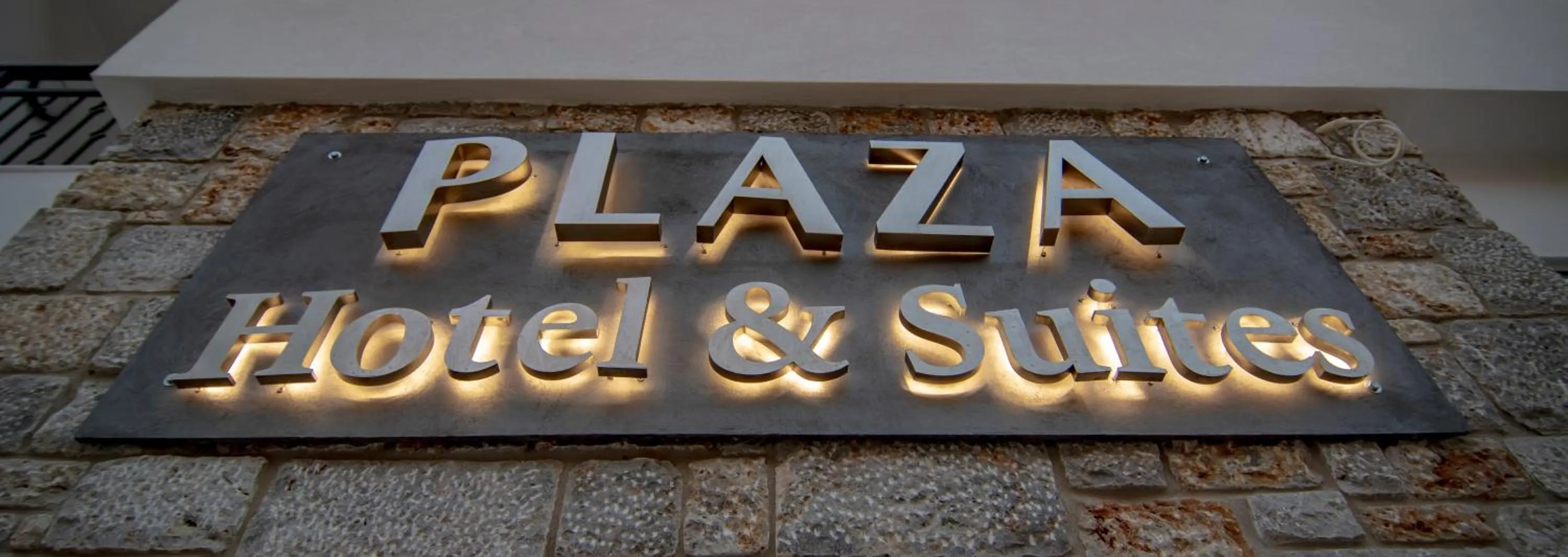 Property logo or sign in Plaza Hotel