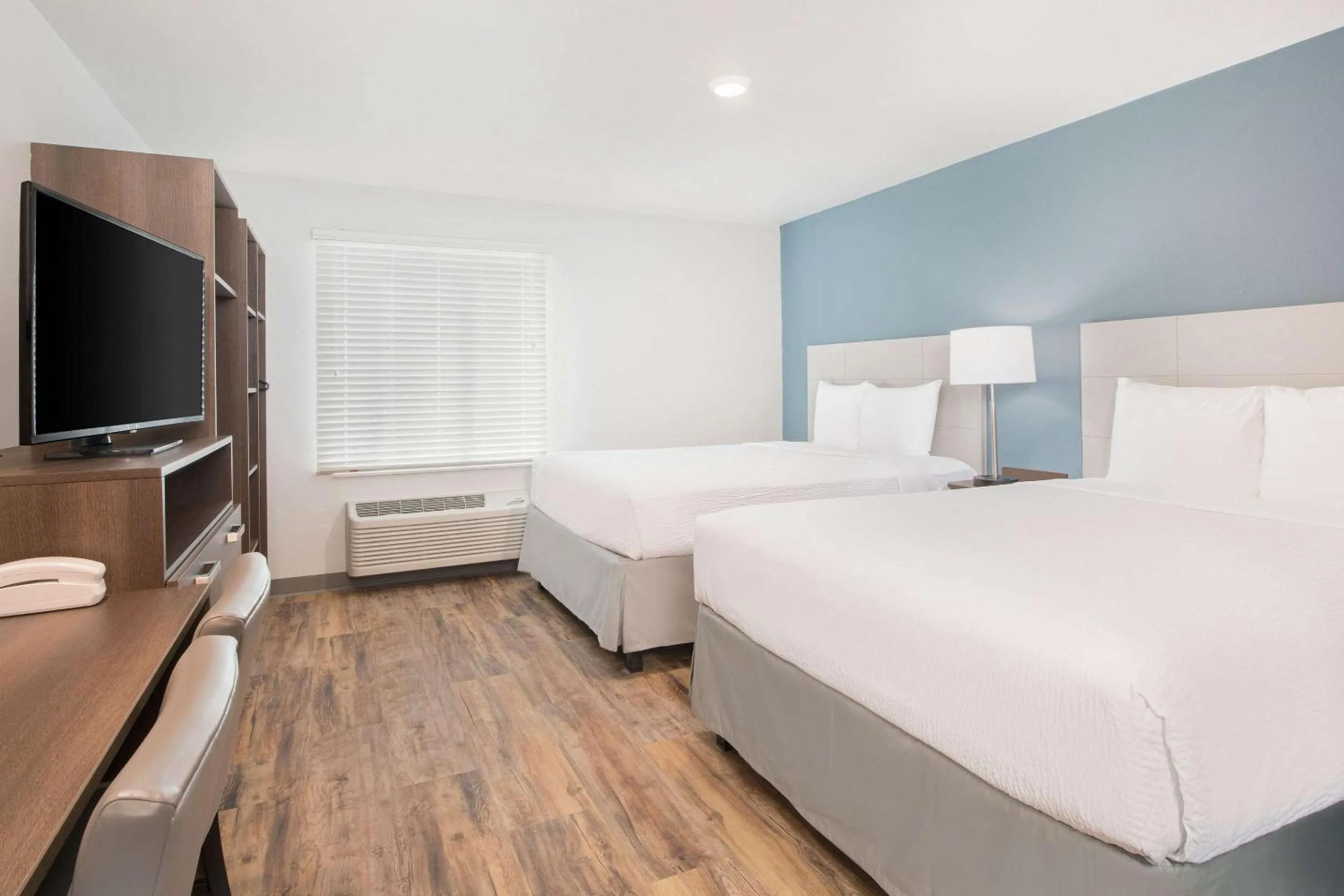 Bedroom, Bed in WoodSpring Suites Savannah Pooler