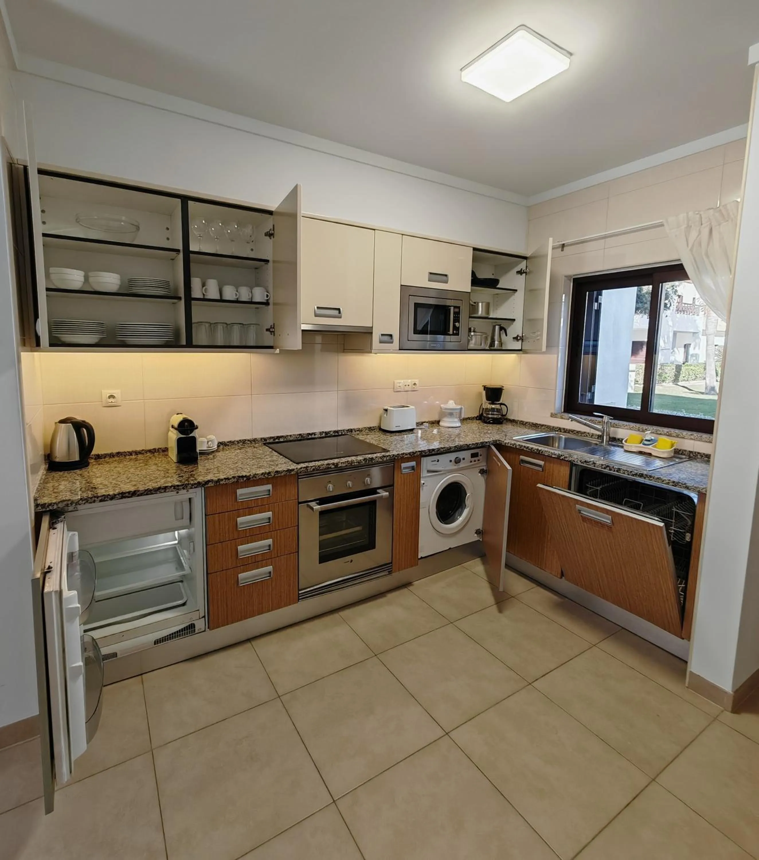 Kitchen or kitchenette in Sagres Time Apartamentos