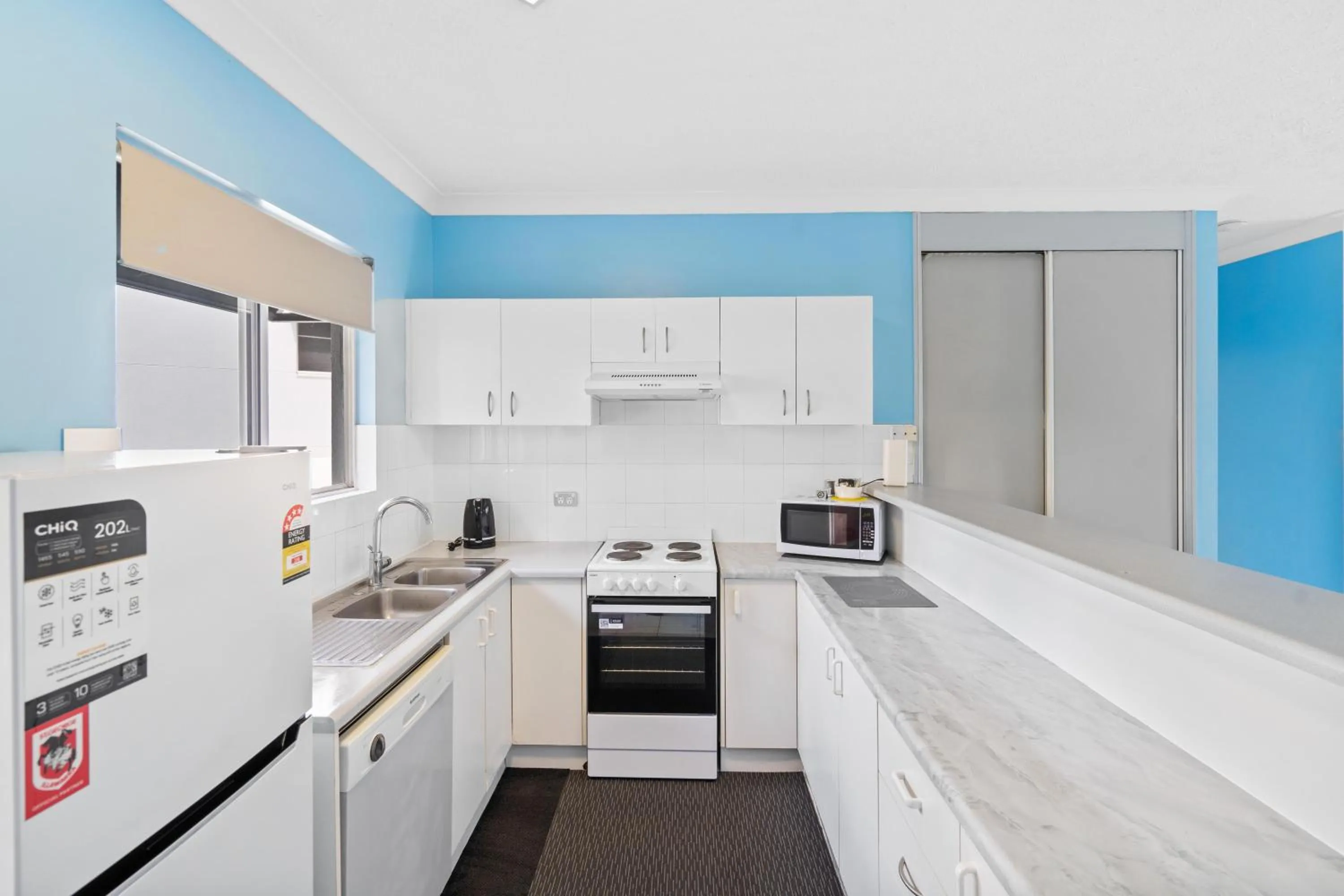 kitchen in Citysider Cairns Holiday Apartments