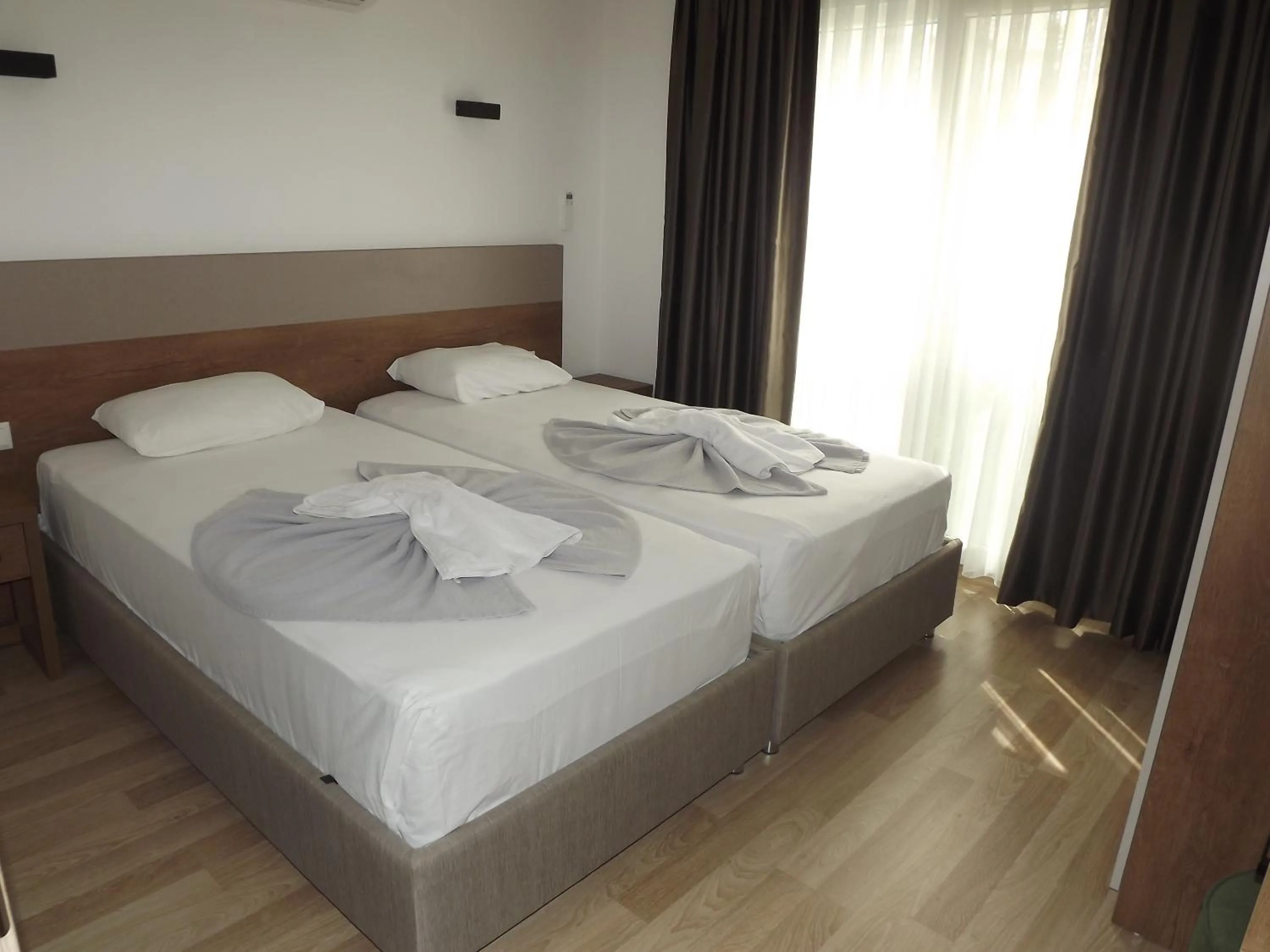 Bed in Opus Apart Hotel