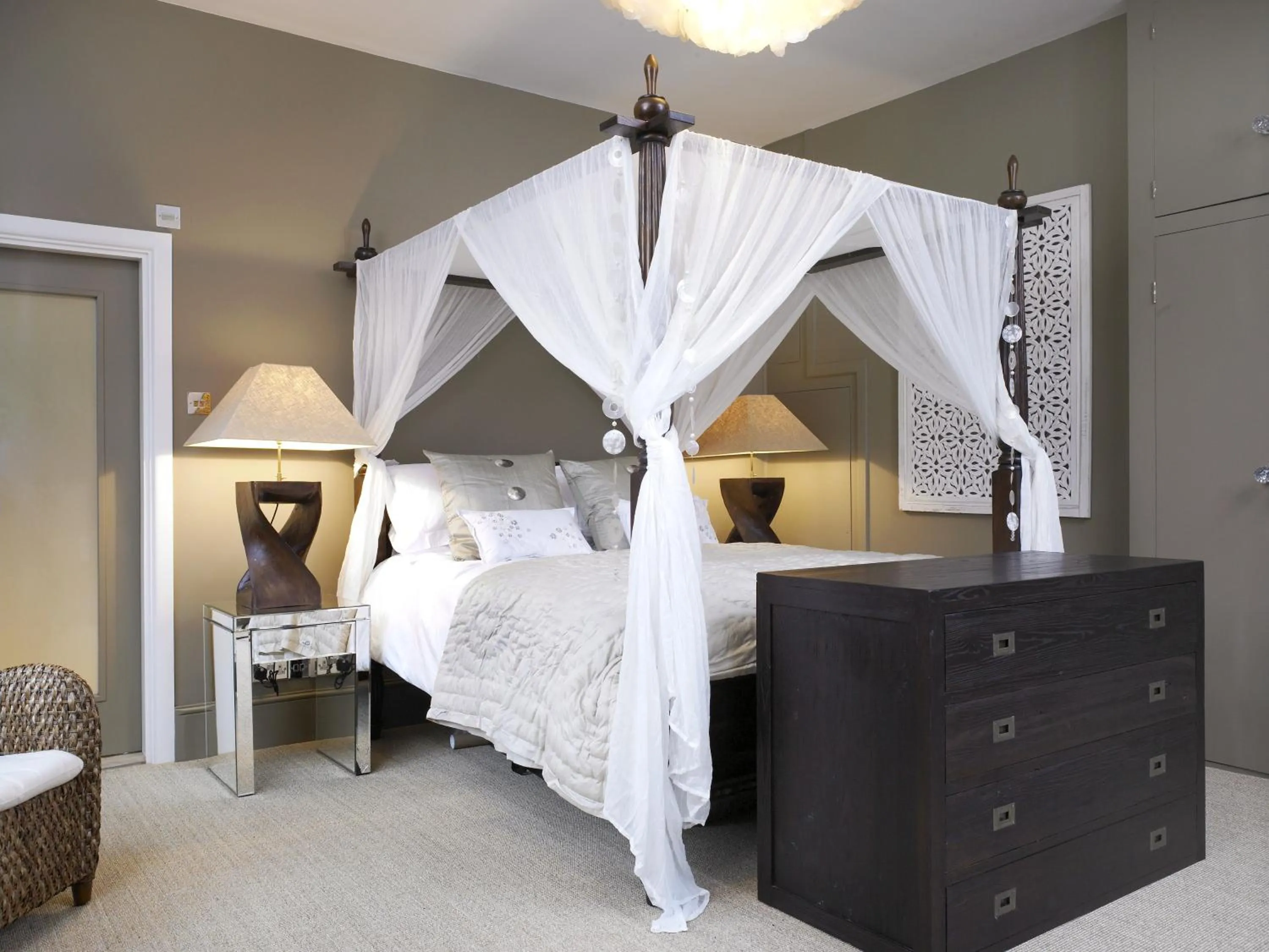 Bed in Windfalls Boutique Hotel