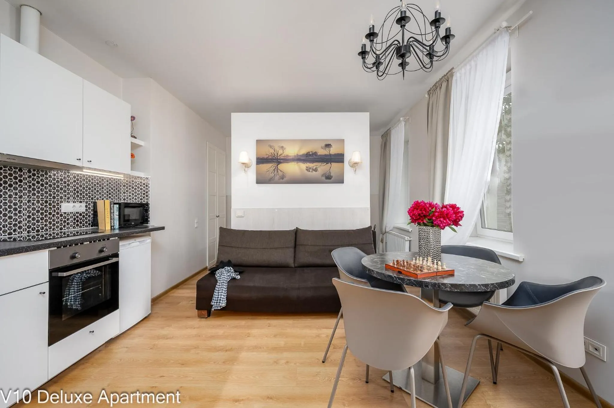 Kitchen or kitchenette in HOME Apart-Hotel Vilnius