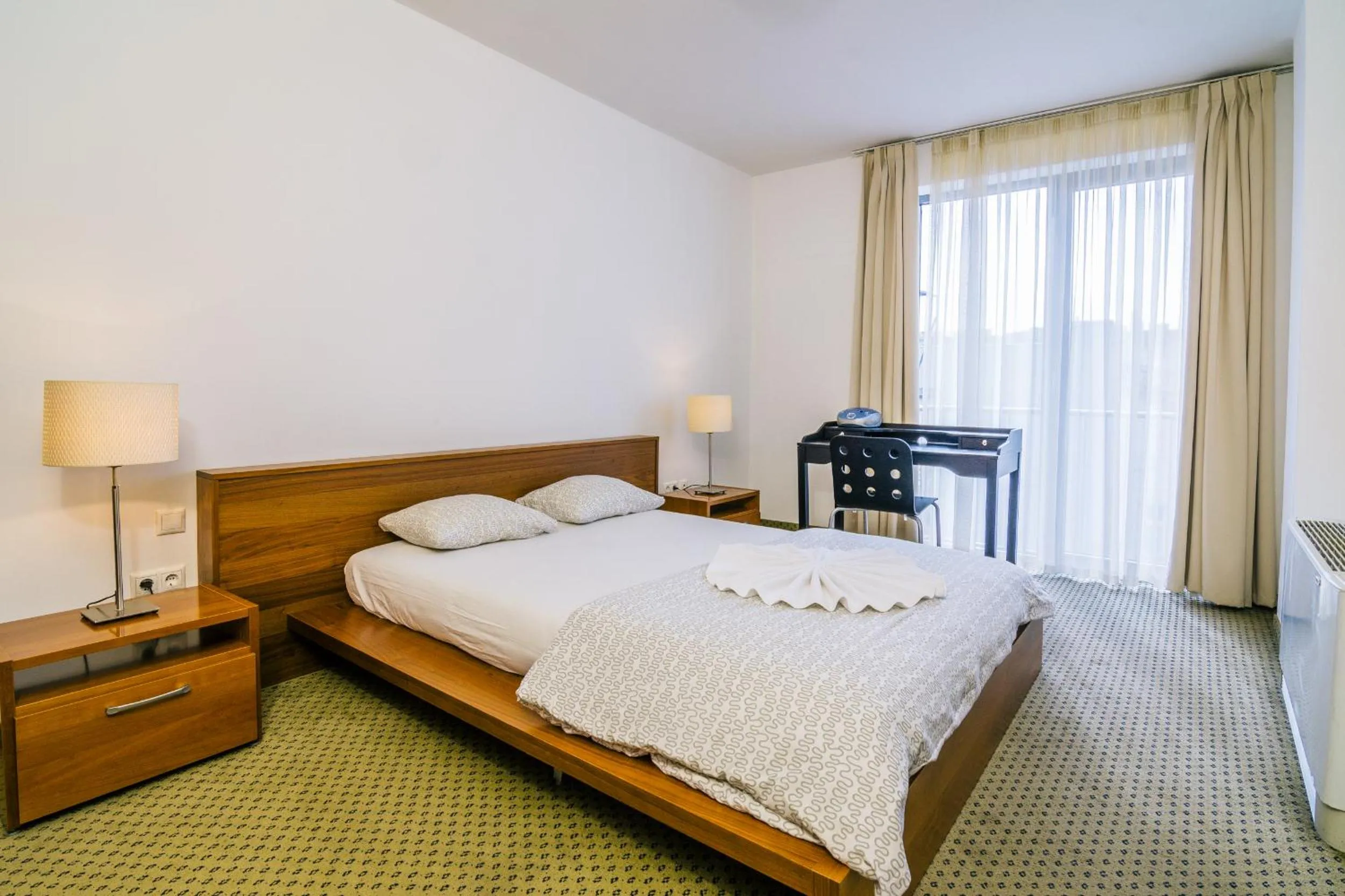 Bedroom in City Gardens Hotel & Wellness