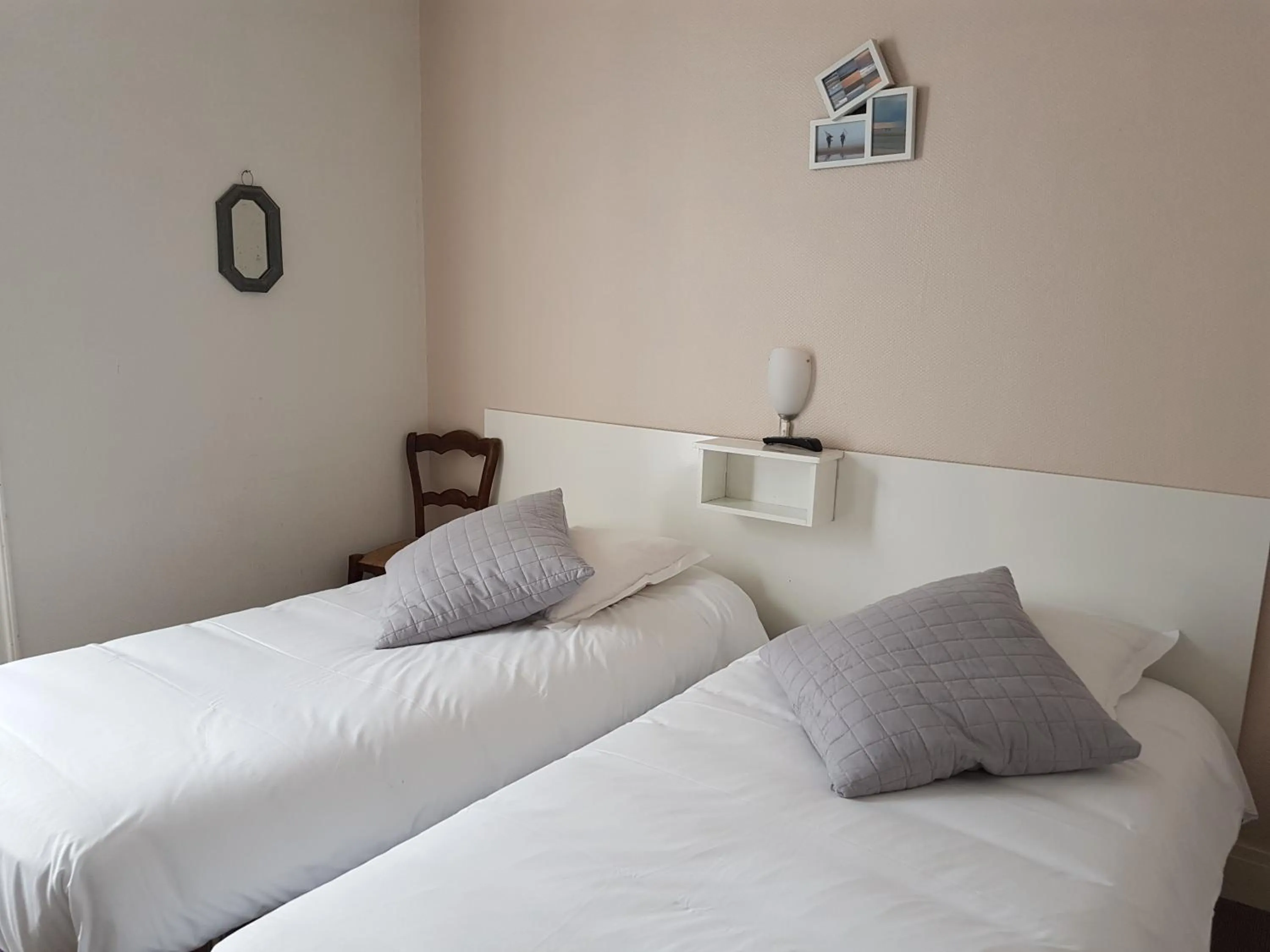 Bed in Hotel de Normandie