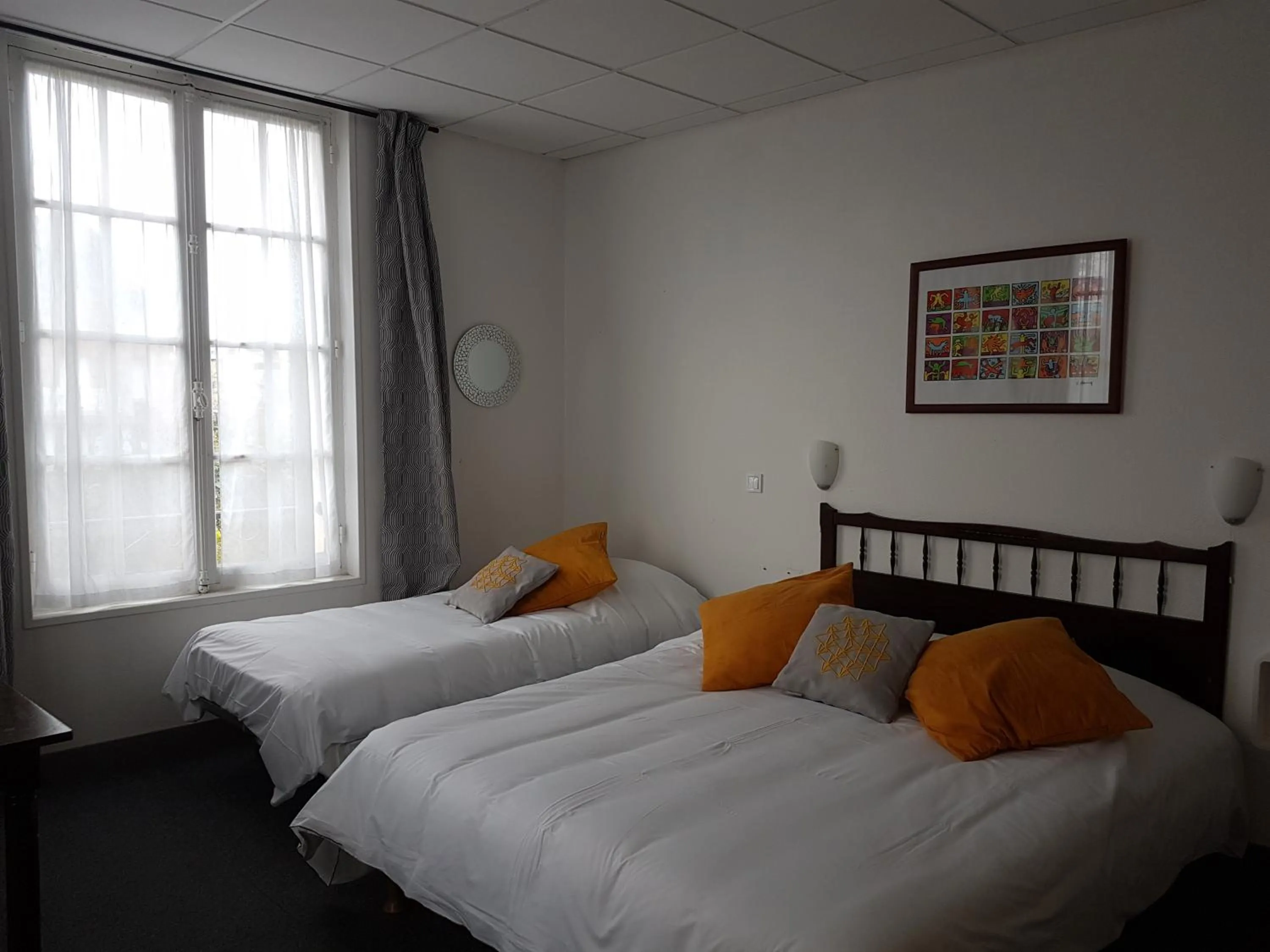 Bed in Hotel de Normandie