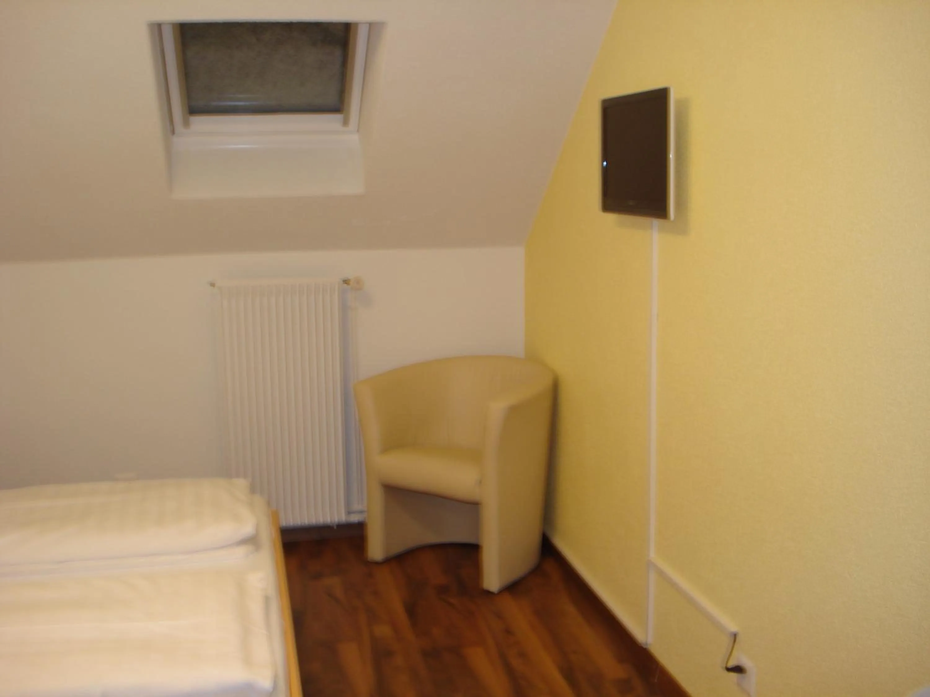 Seating area, Bed in Hotel Gregory