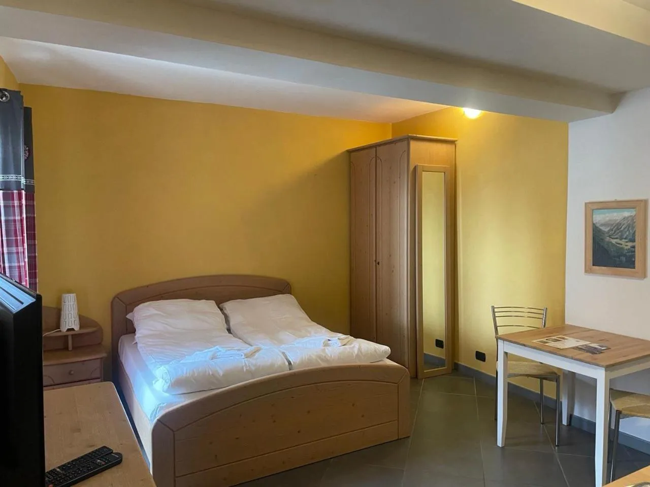 Living room, Bed in Residence Le Marmotte