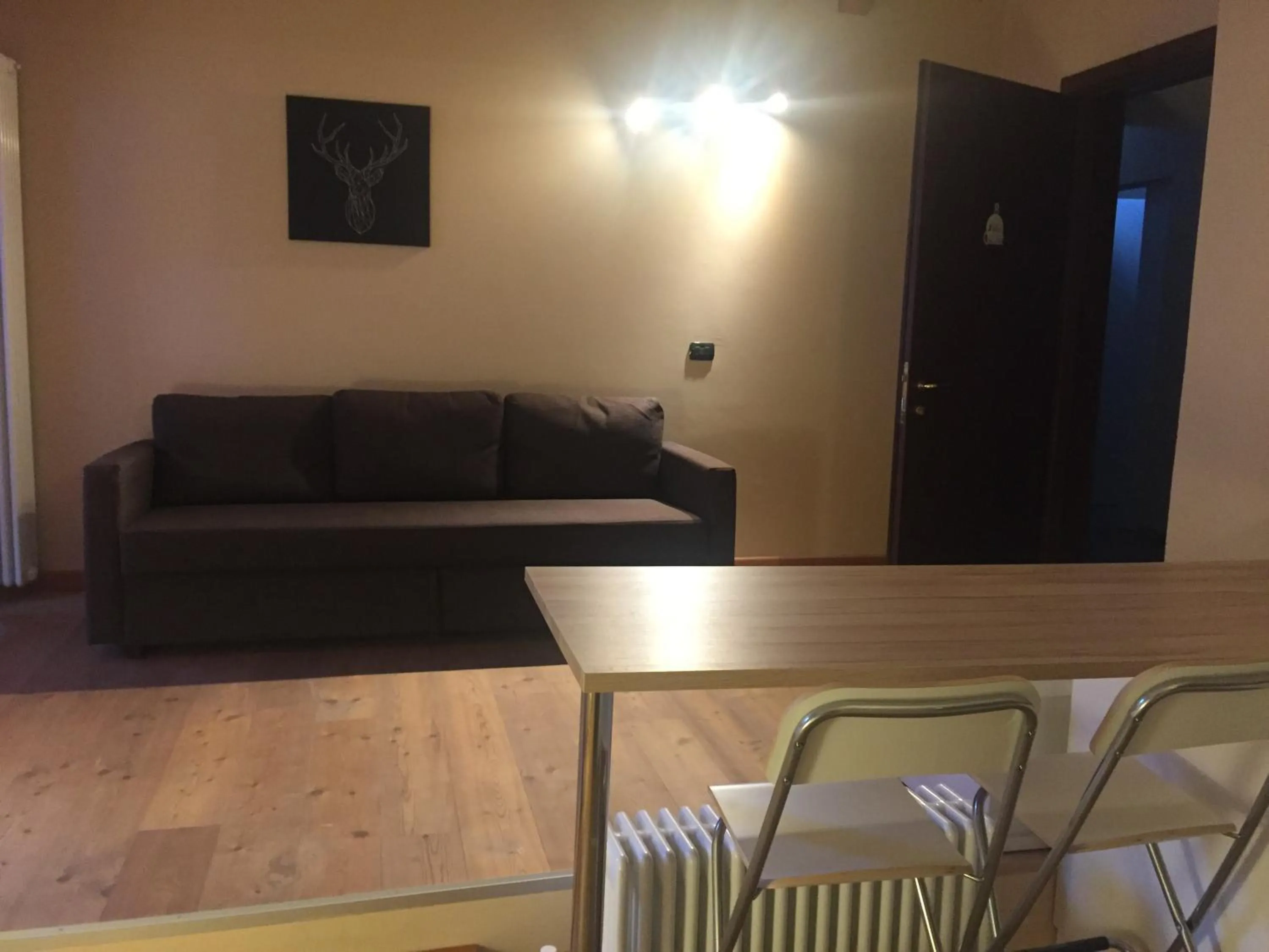 Seating area in Residence Le Marmotte