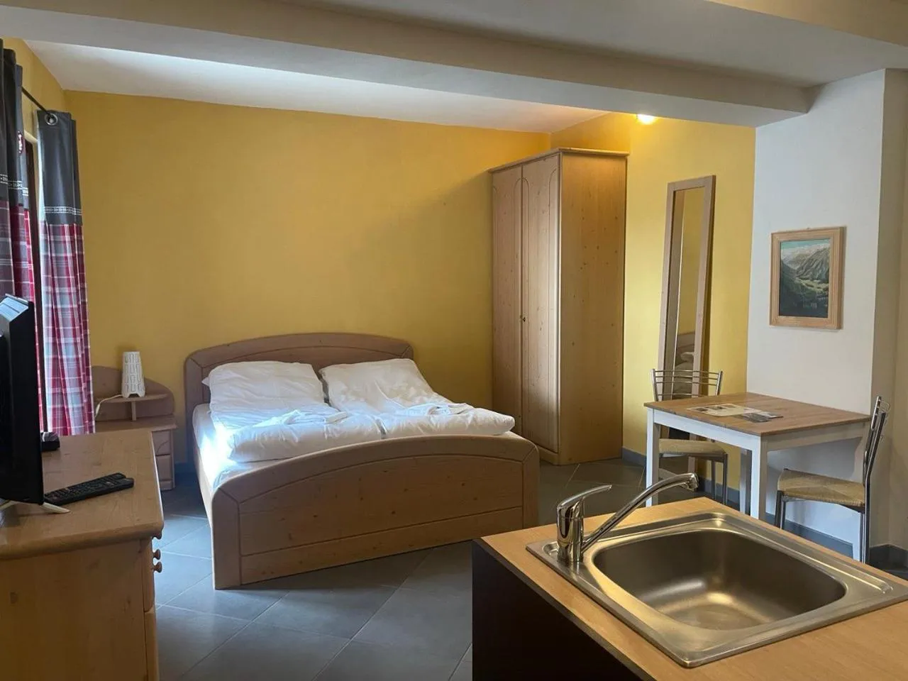 Living room, Bed in Residence Le Marmotte