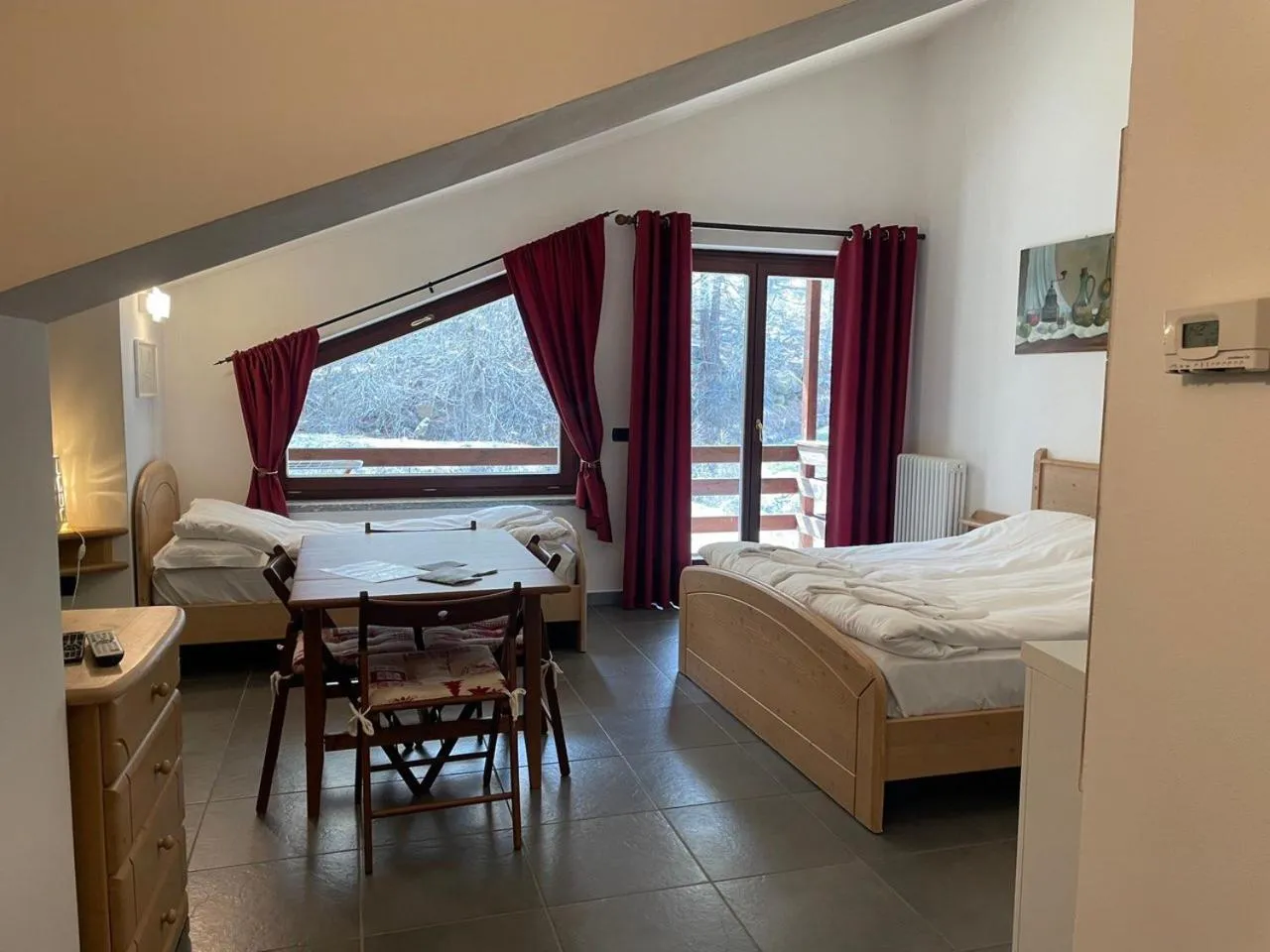 Living room, Bed in Residence Le Marmotte