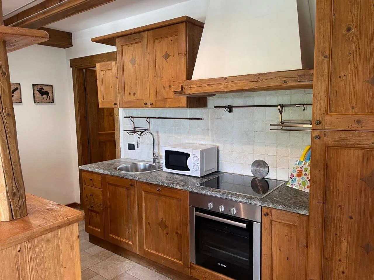 Kitchen or kitchenette in Residence Le Marmotte