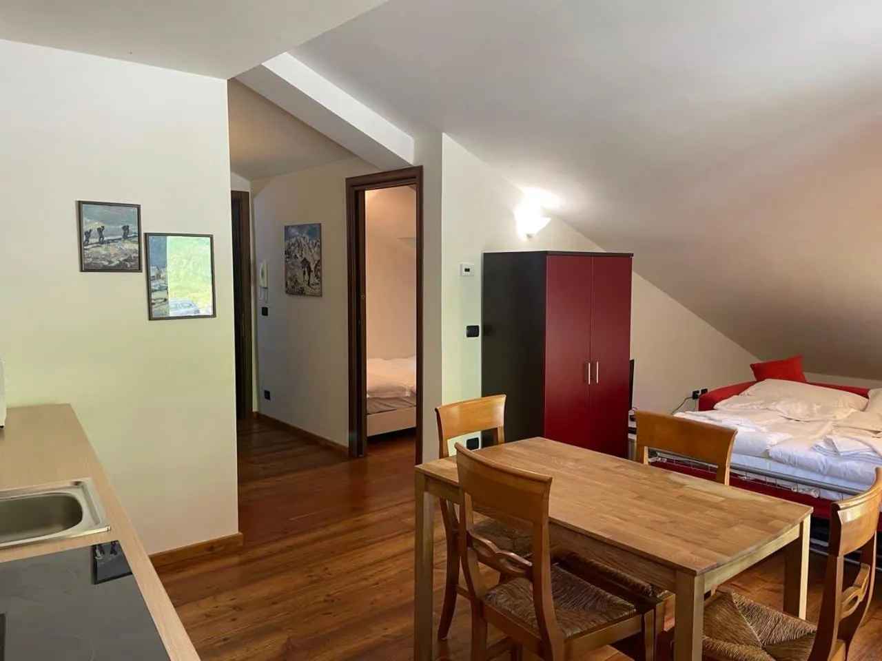 Living room, Bed in Residence Le Marmotte