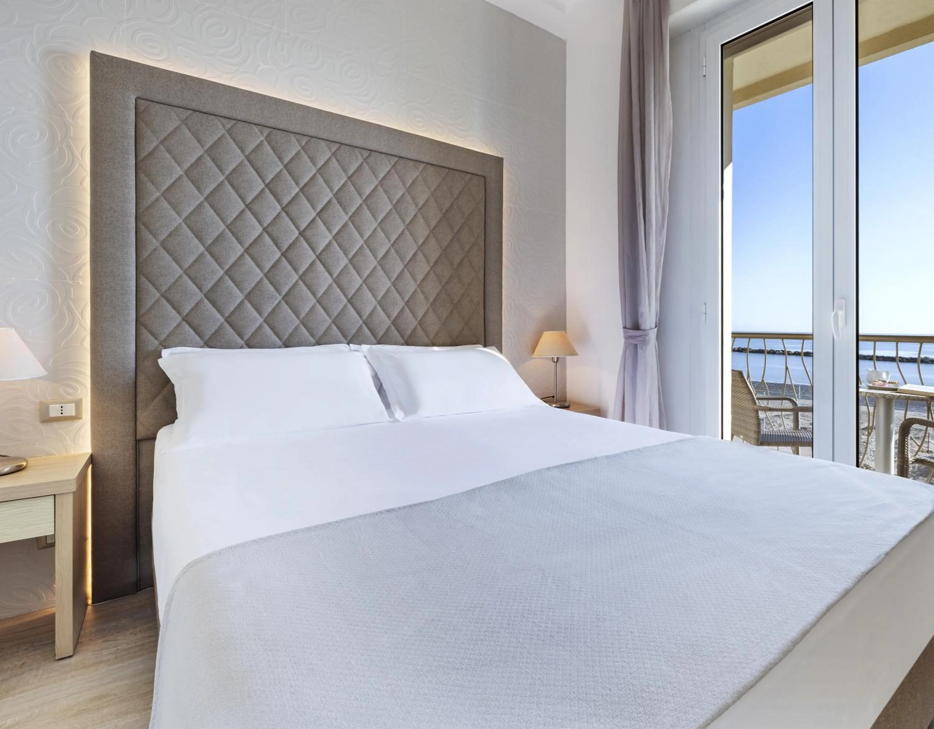 Bed in Hotel Riviera